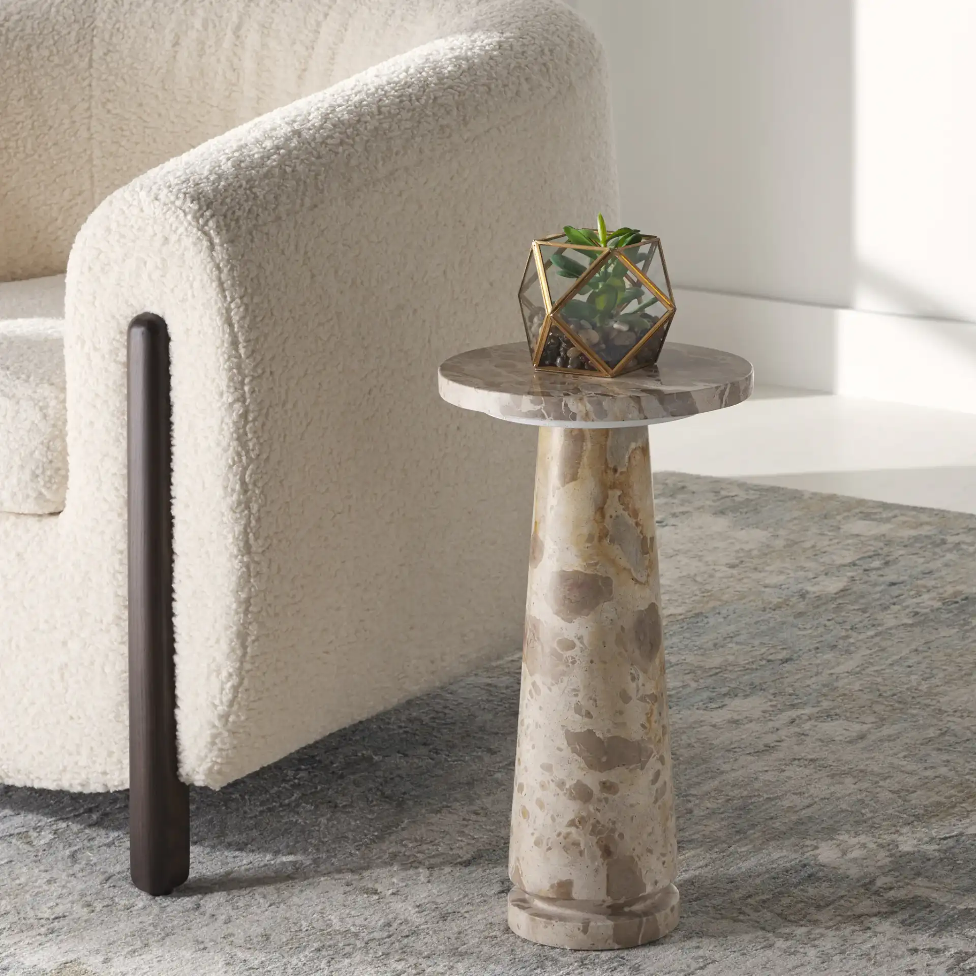 Valentia Round Marble Accent Table in Beige in a styled room