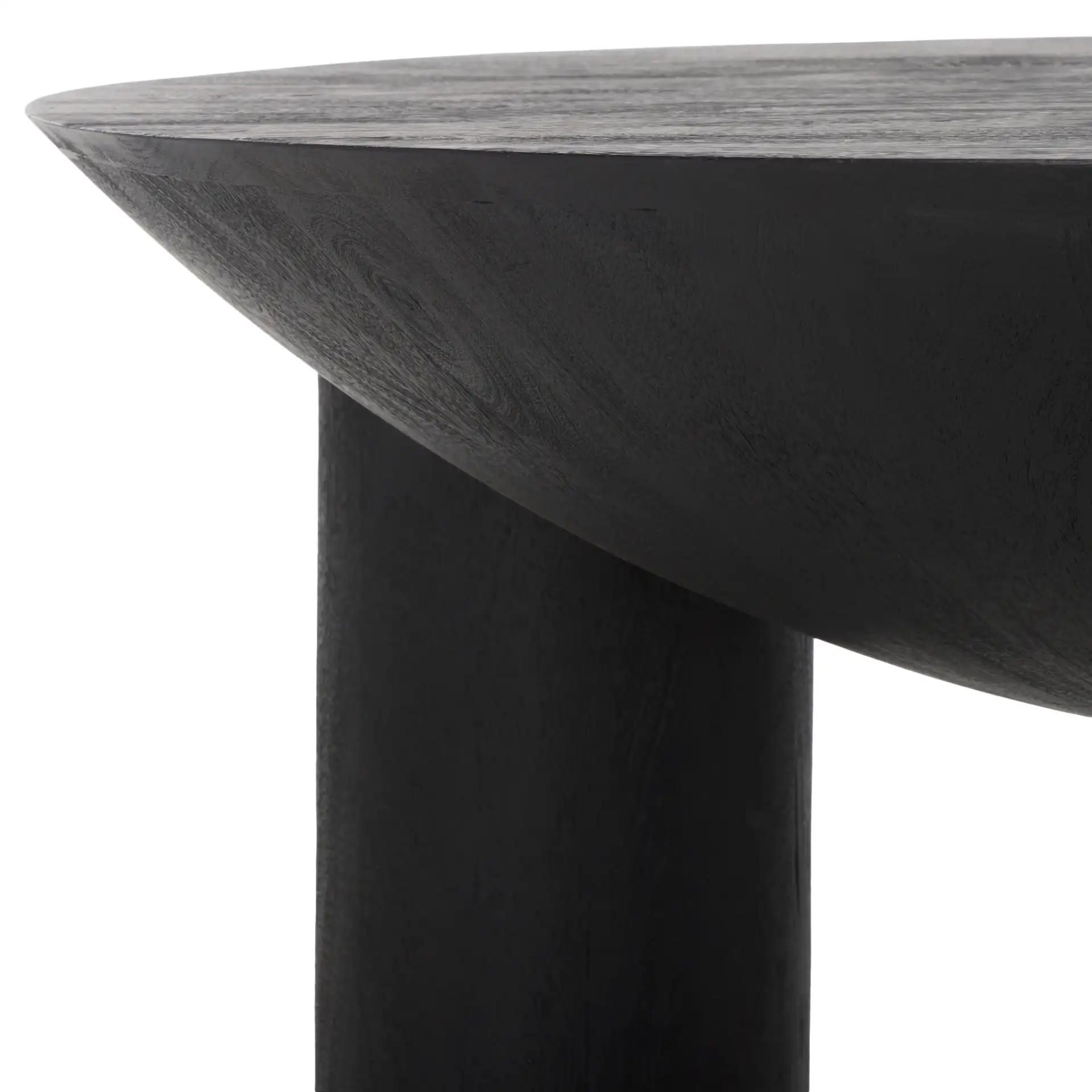 Calhoun Round Wood Coffee Table in Black in a styled room