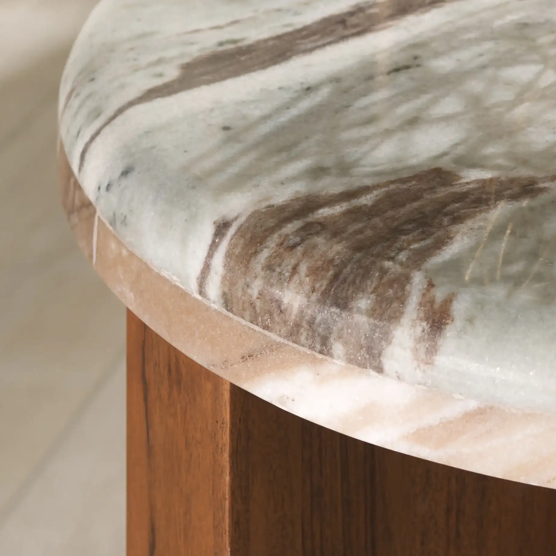 Malkin Round Marble Accent Table in Brown / Dark Brown in a styled room