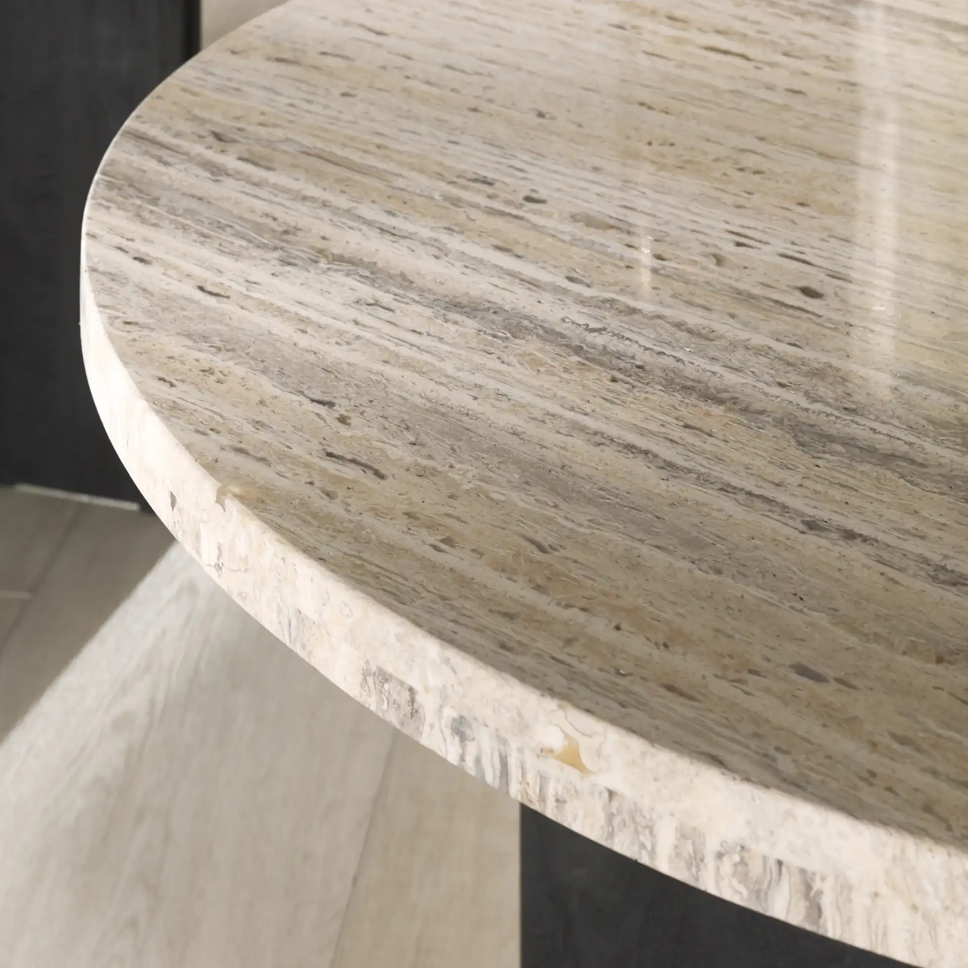 Shayna Travertine Coffee Table in Travertine / Black in a styled room