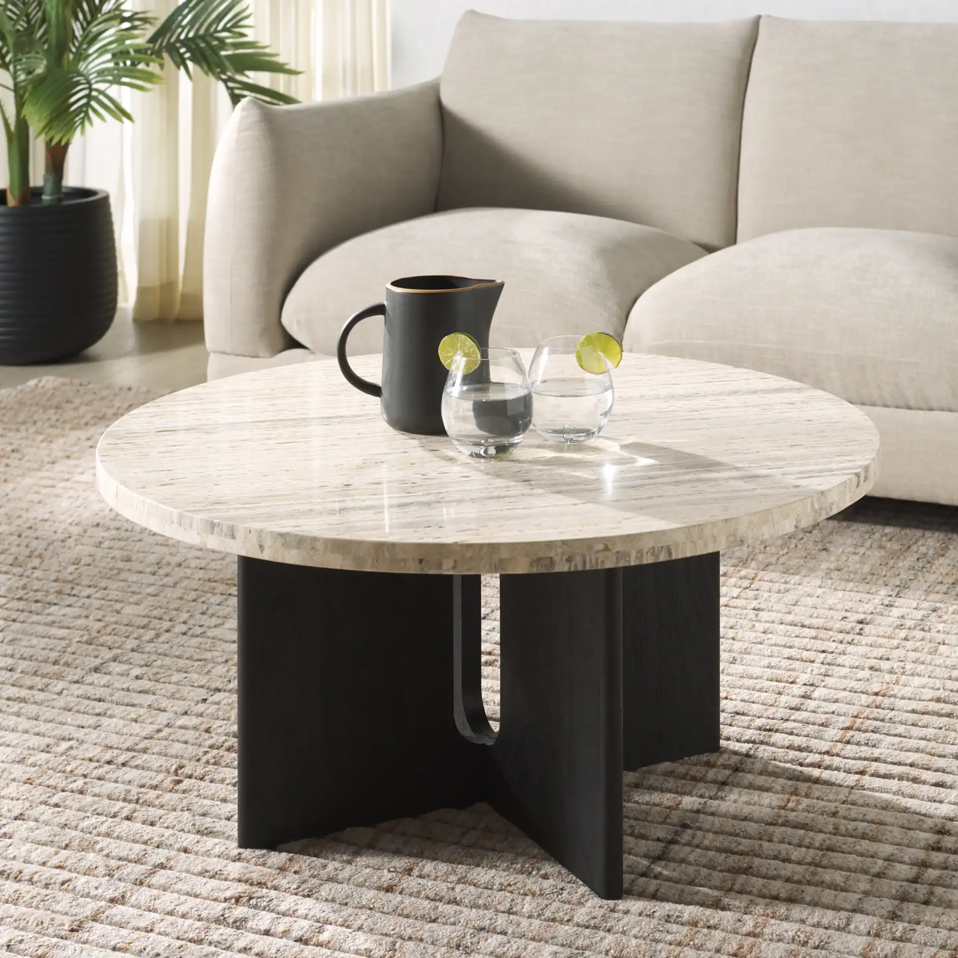Shayna Travertine Coffee Table in Travertine / Black in a styled room