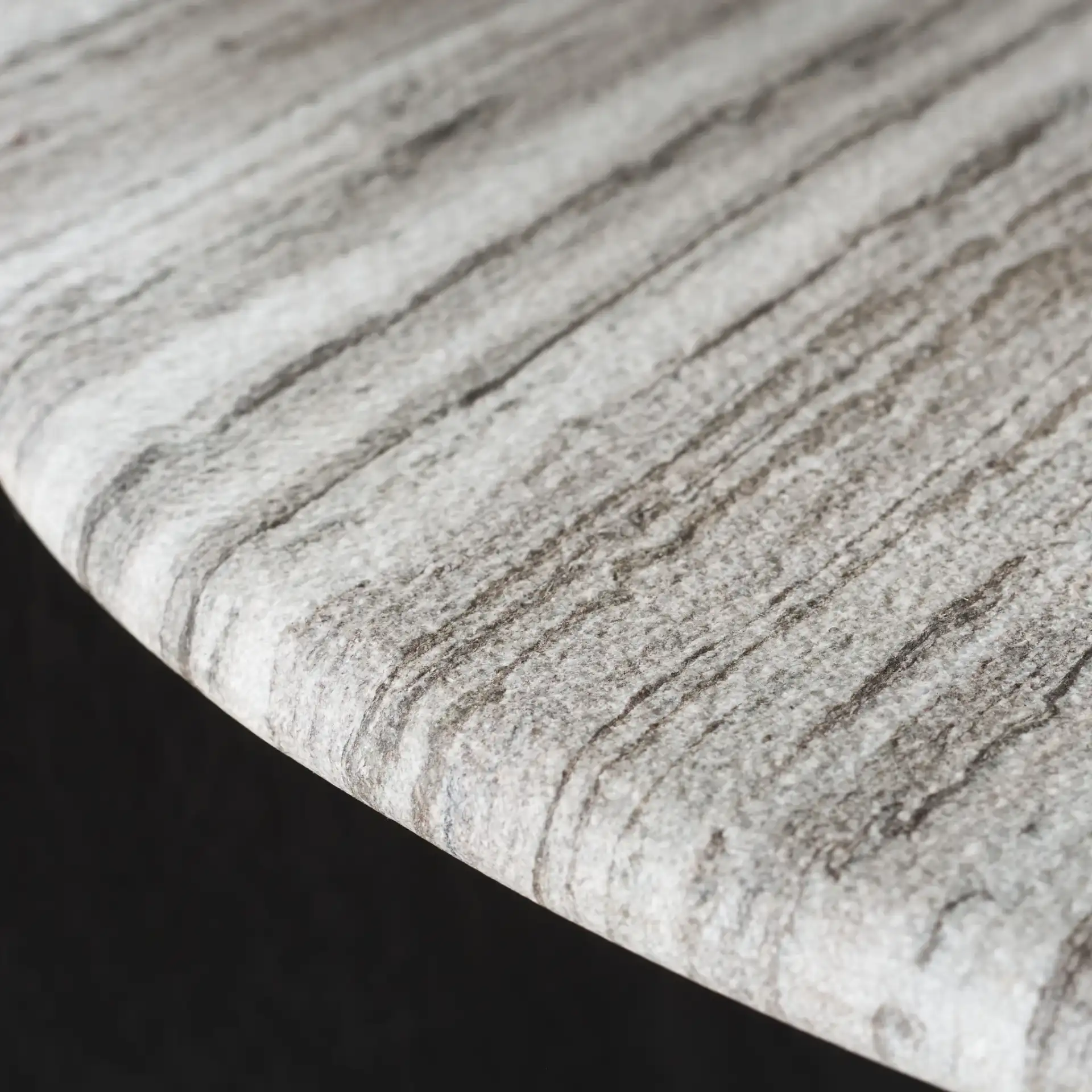 Graelyn Marble Top Coffee Table in Black / Gray in a styled room