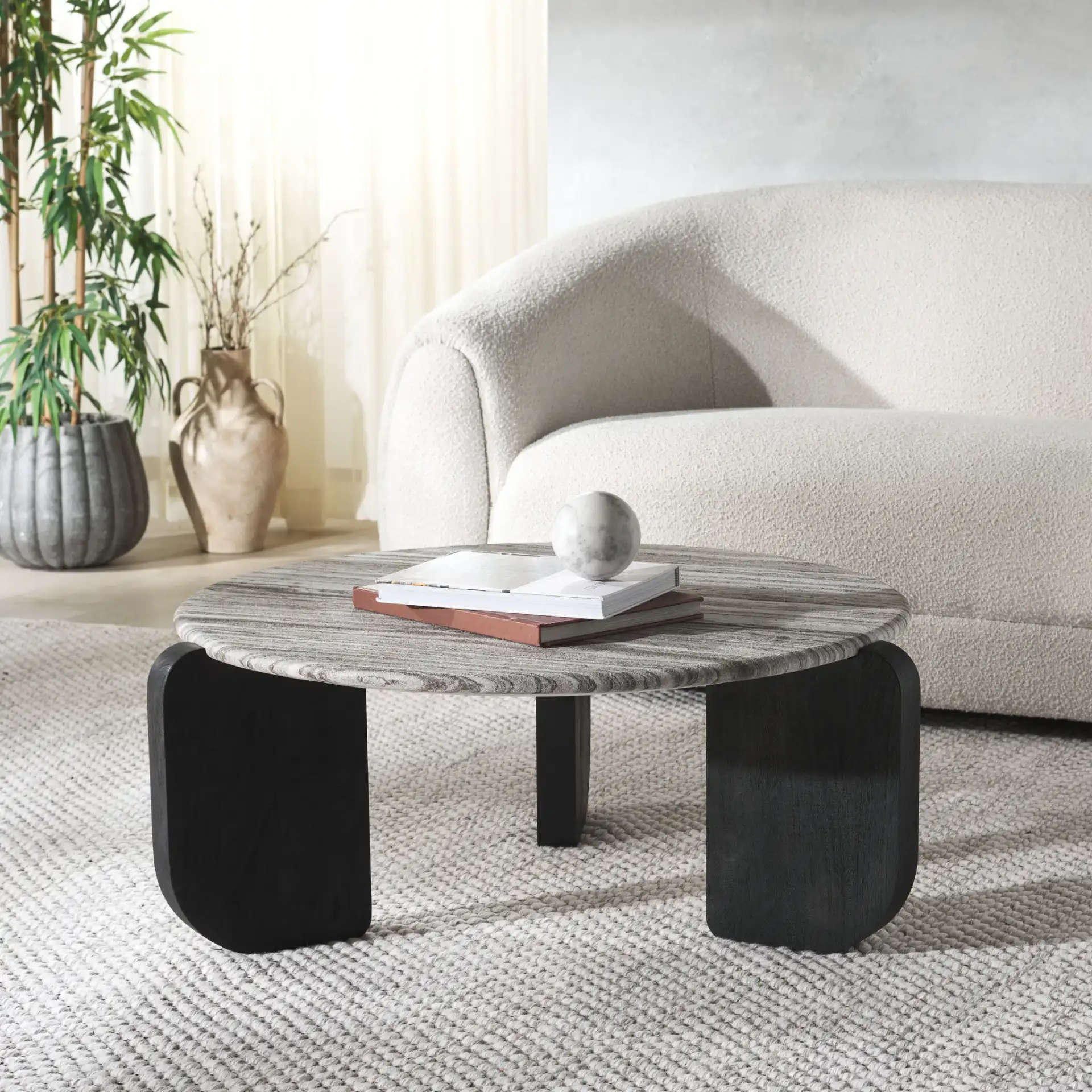 Graelyn Marble Top Coffee Table in Black / Gray in a styled room