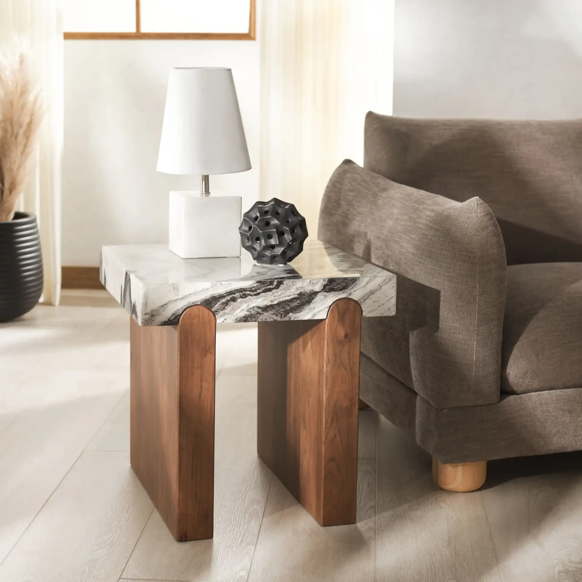 Ellebeth Marble Top Accent Table in Hazel / Walnut in a styled room