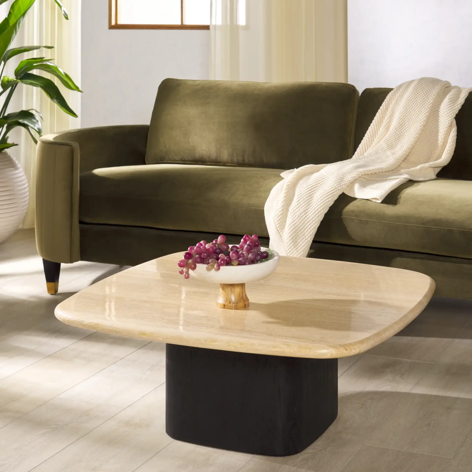 Celestyn Square Travertine Coffee Table in Travertine / Black in a styled room