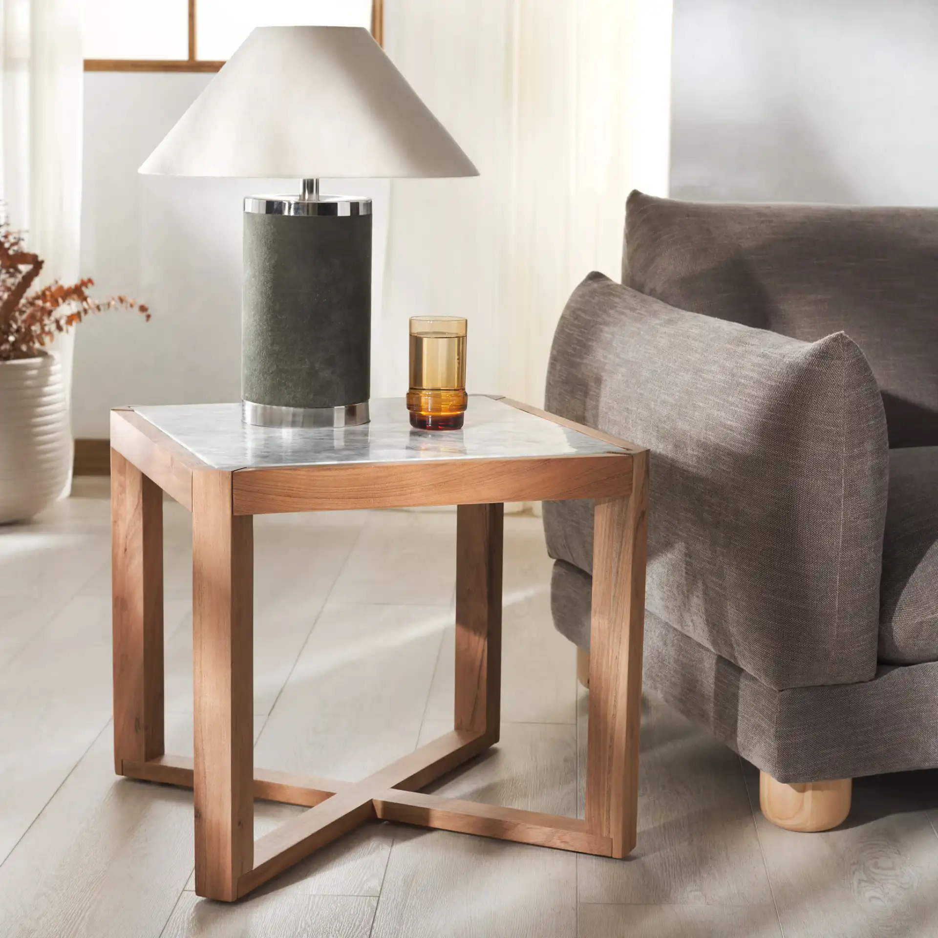 Bernardi Marble Top Accent Table in Natural / White in a styled room