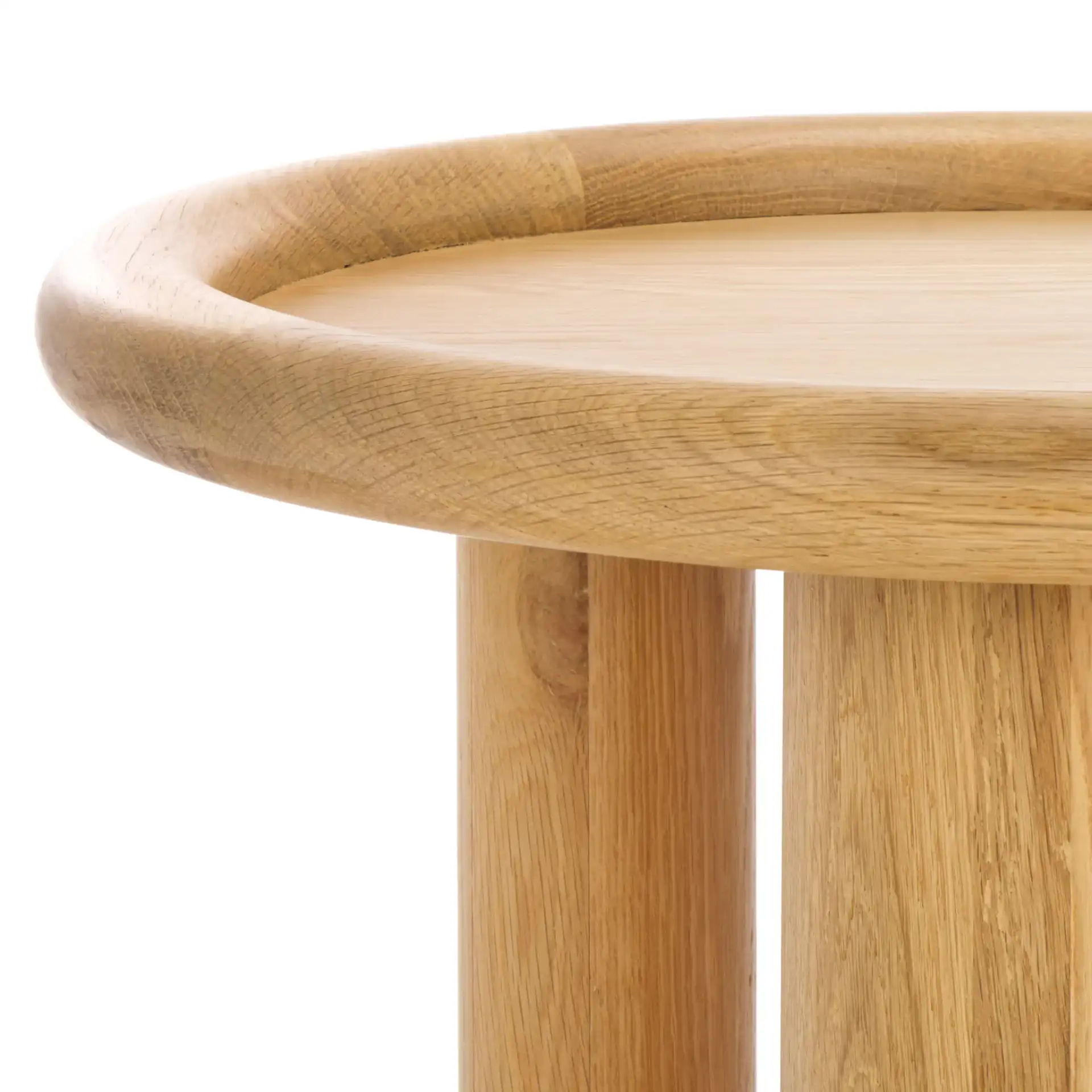 Madelynn Round Wood Accent Table in Natural in a styled room