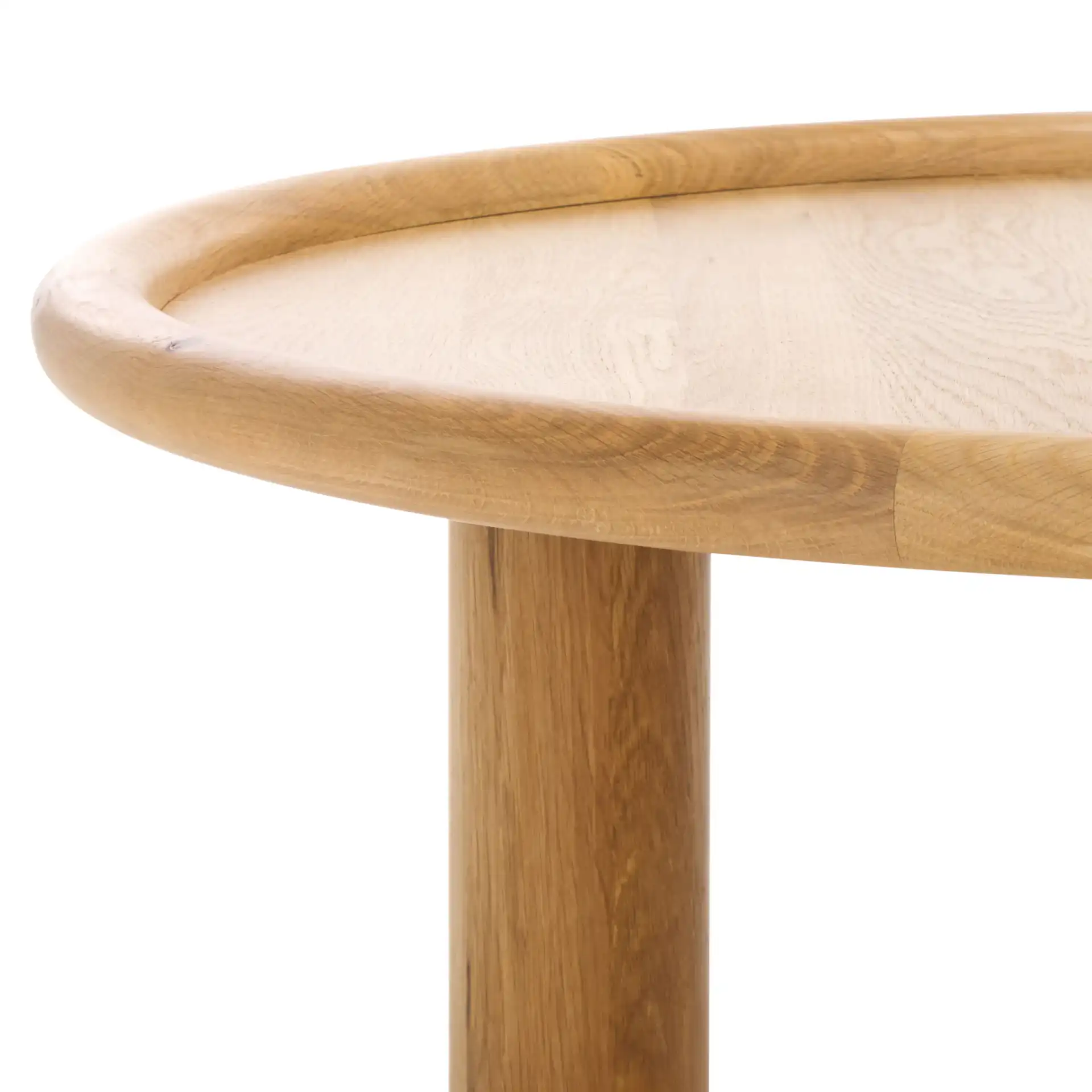 Madelynn Round Wood Coffee Table in Natural in a styled room