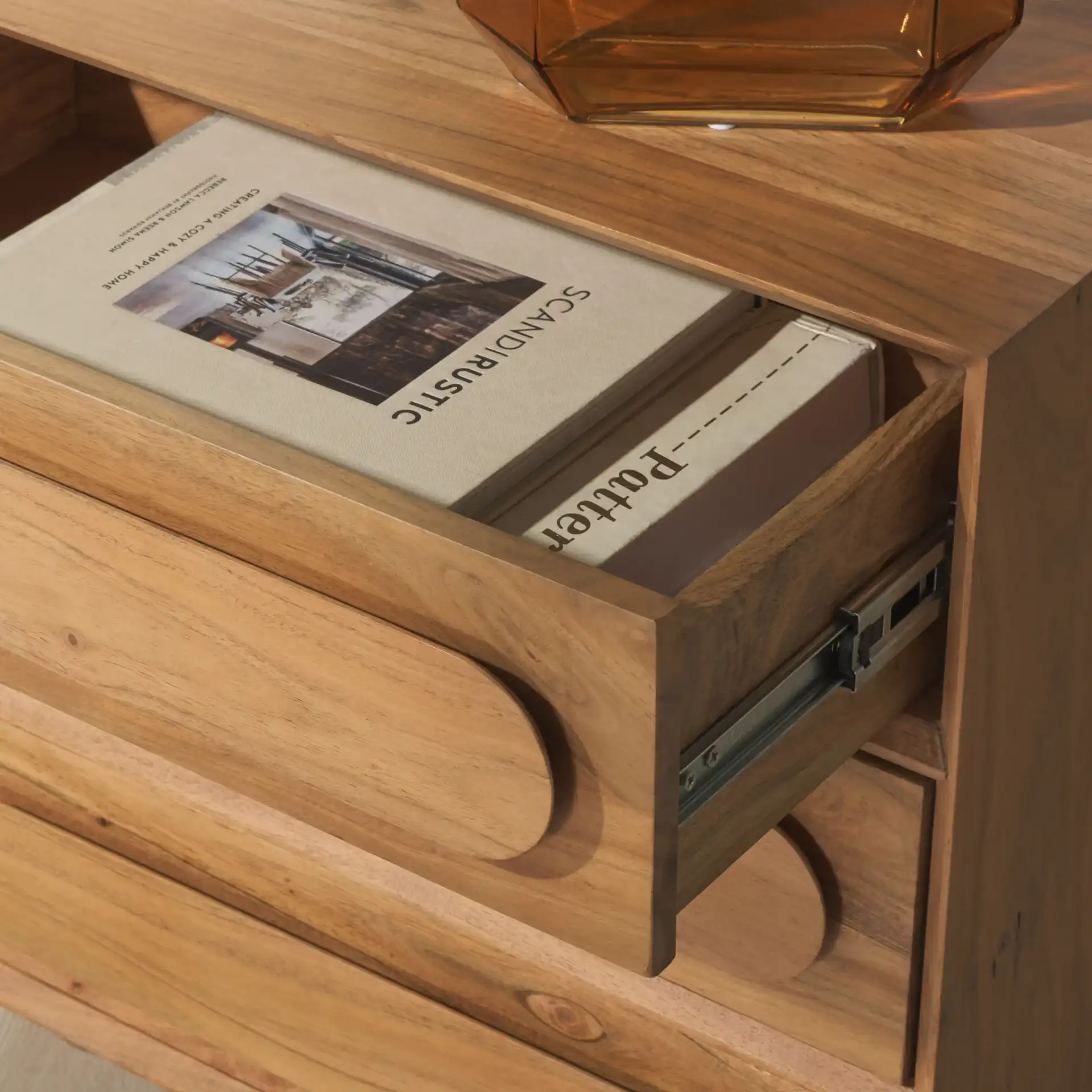 Lesliette Three-Drawer Nightstand in Natural in a styled room