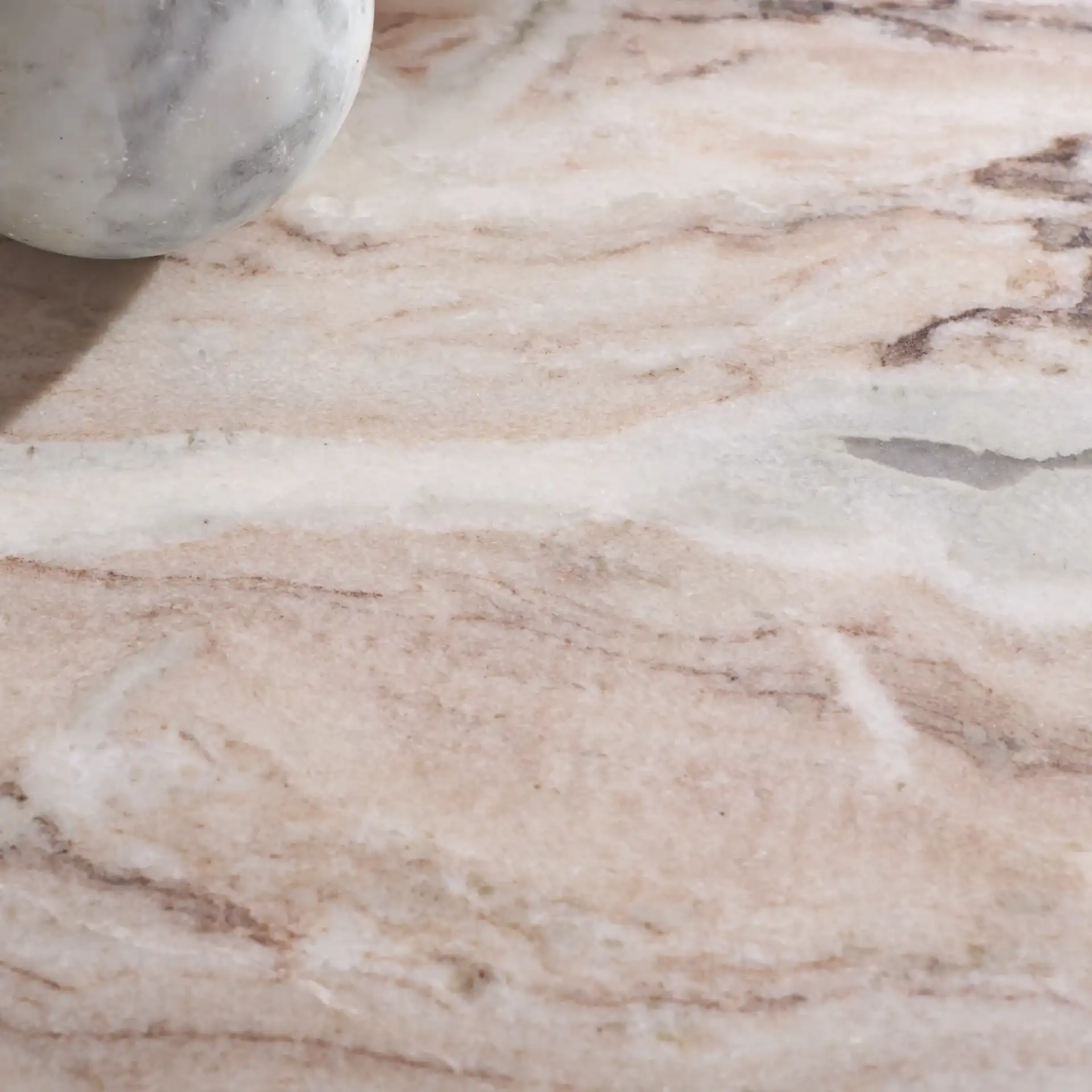 Tobilyn Marble Console Table in White / Brown in a styled room