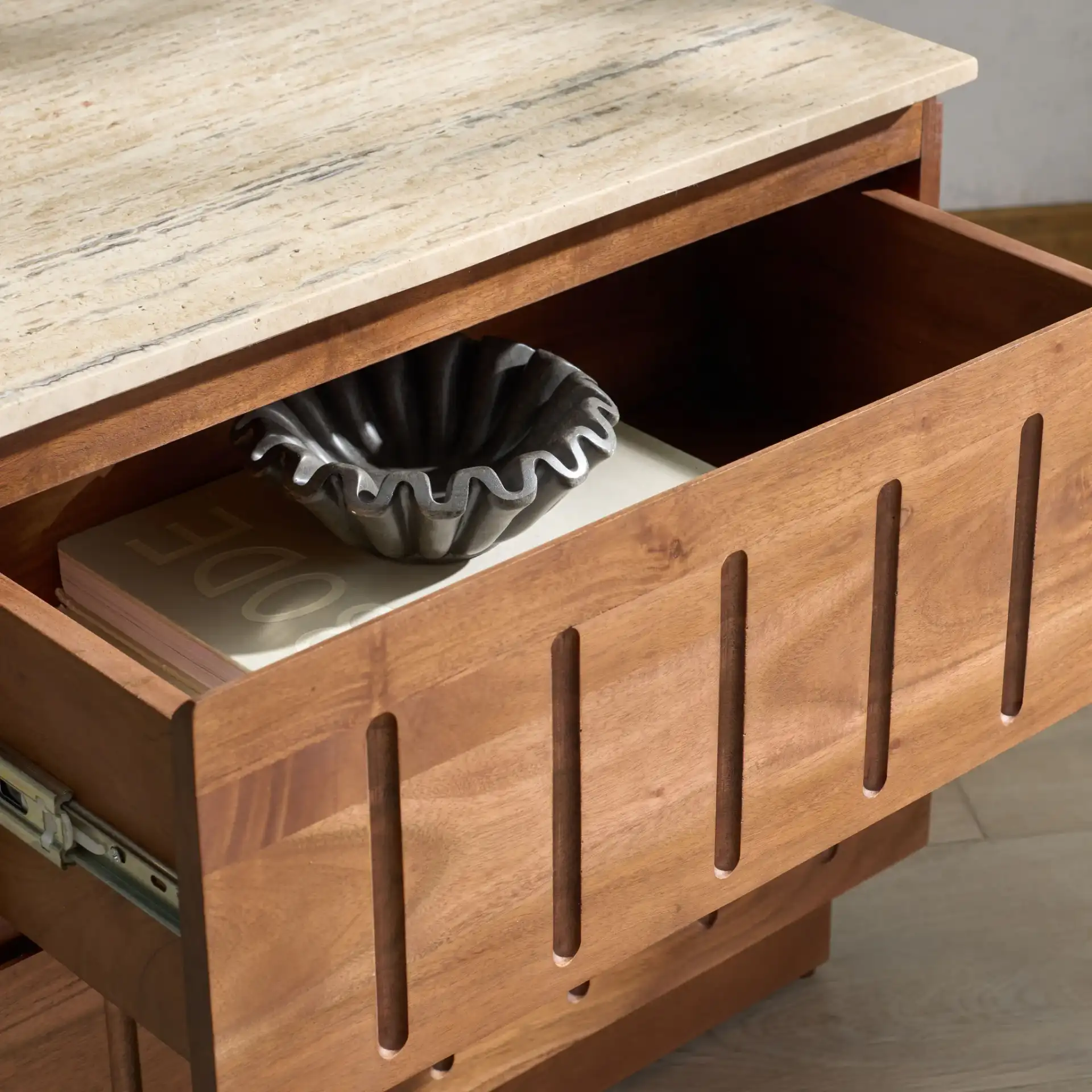 Kaylissa Travertine Nightstand in Travertine / Walnut in a styled room
