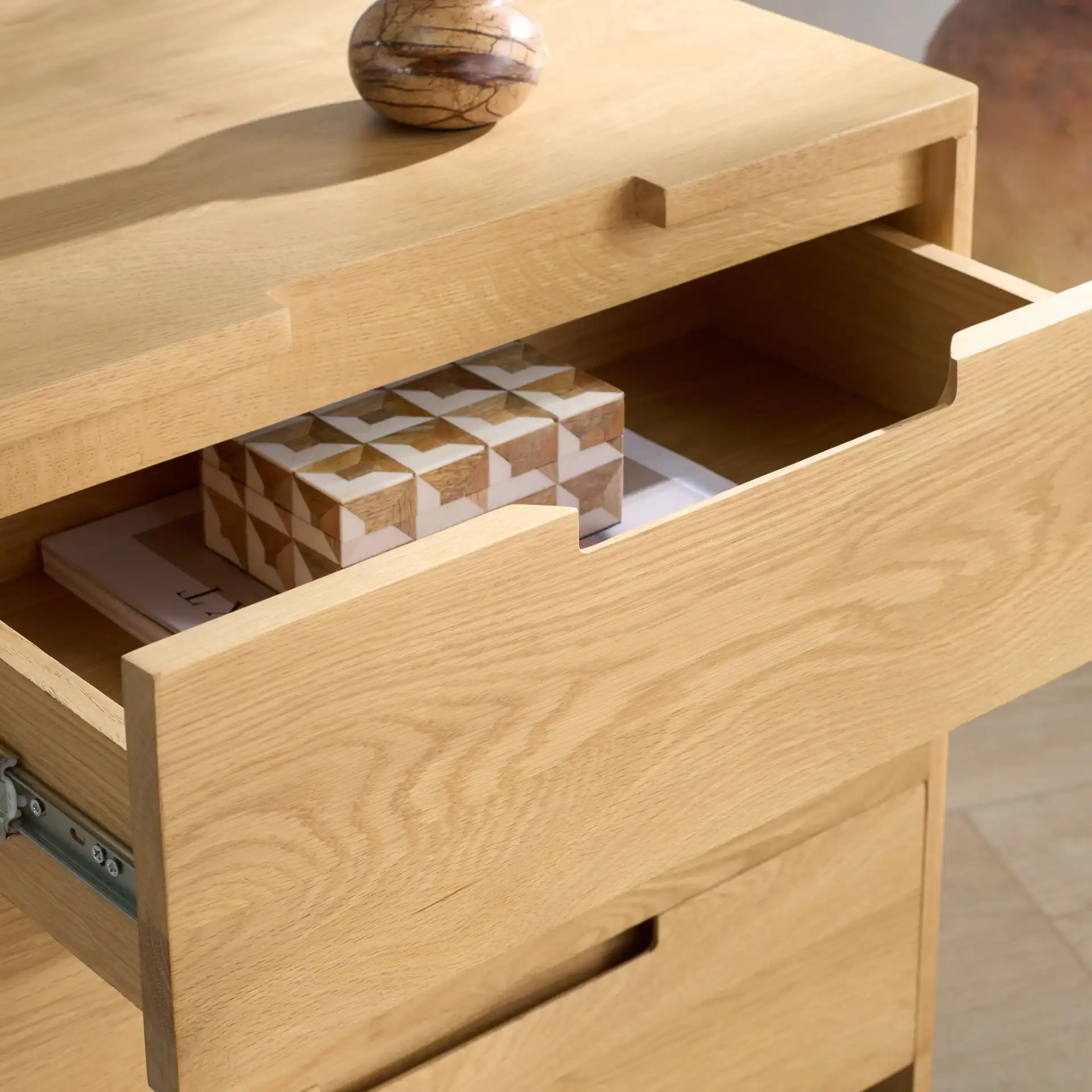 Riverside Oak Wood Nightstand in Natural Oak in a styled room
