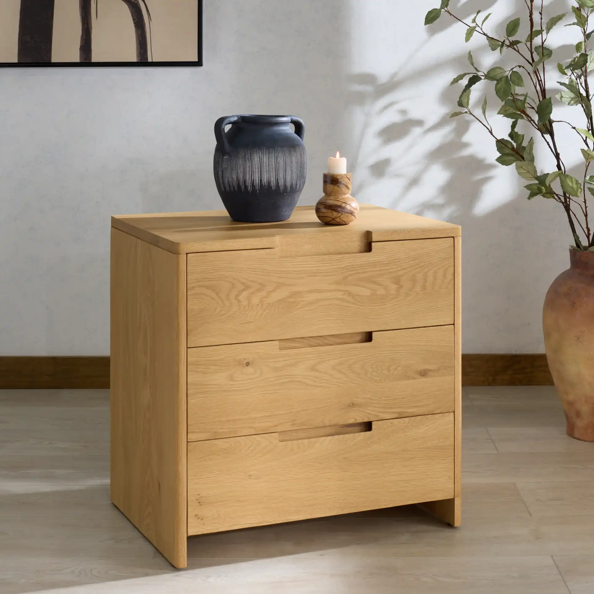 Riverside Oak Wood Nightstand in Natural Oak in a styled room