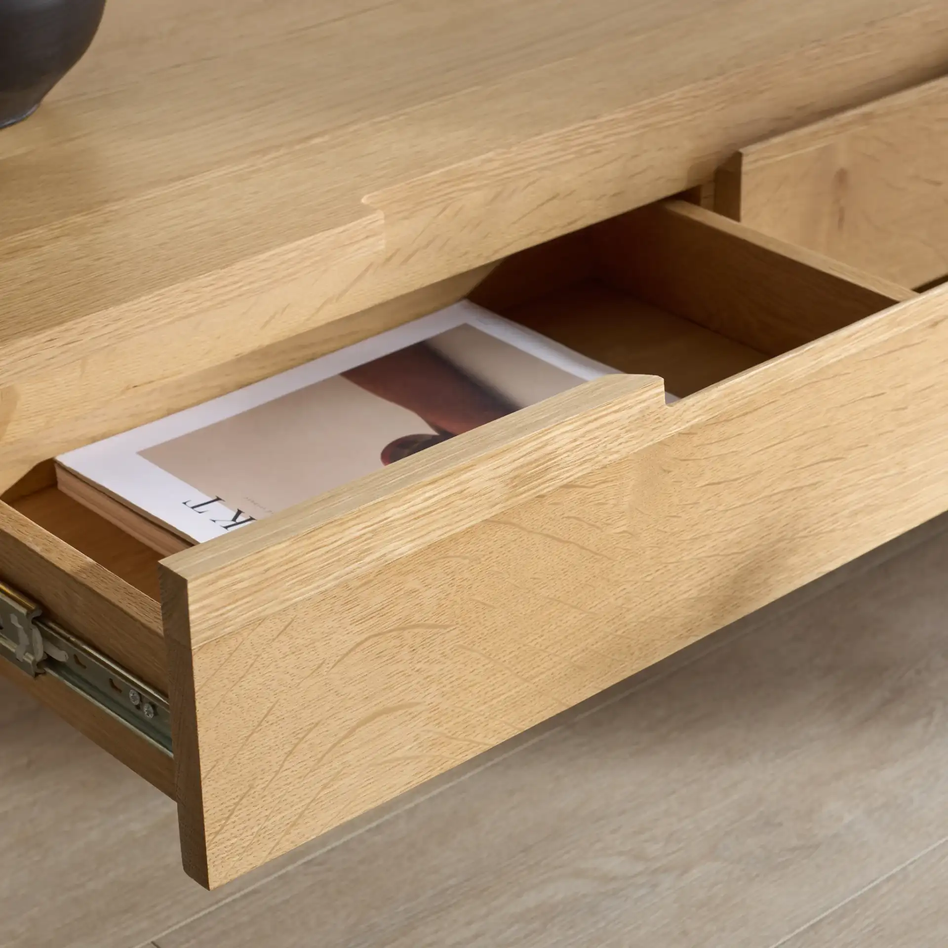 Riverside Oak Wood Coffee Table in Natural Oak in a styled room