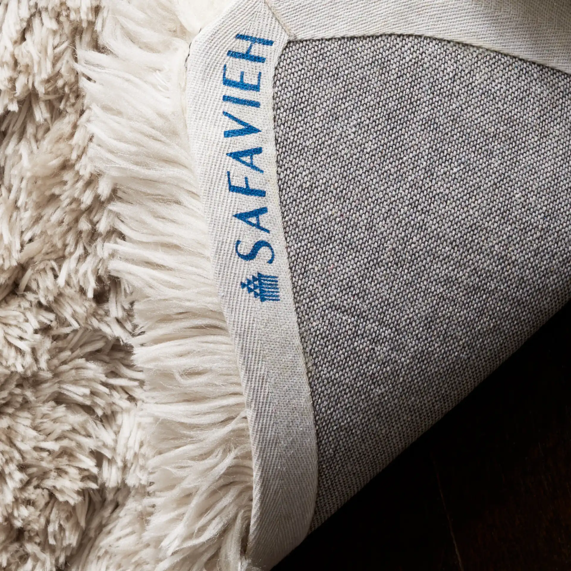 Arctic Solid Hand-Tufted Shag Rug in Light Beige in a styled room