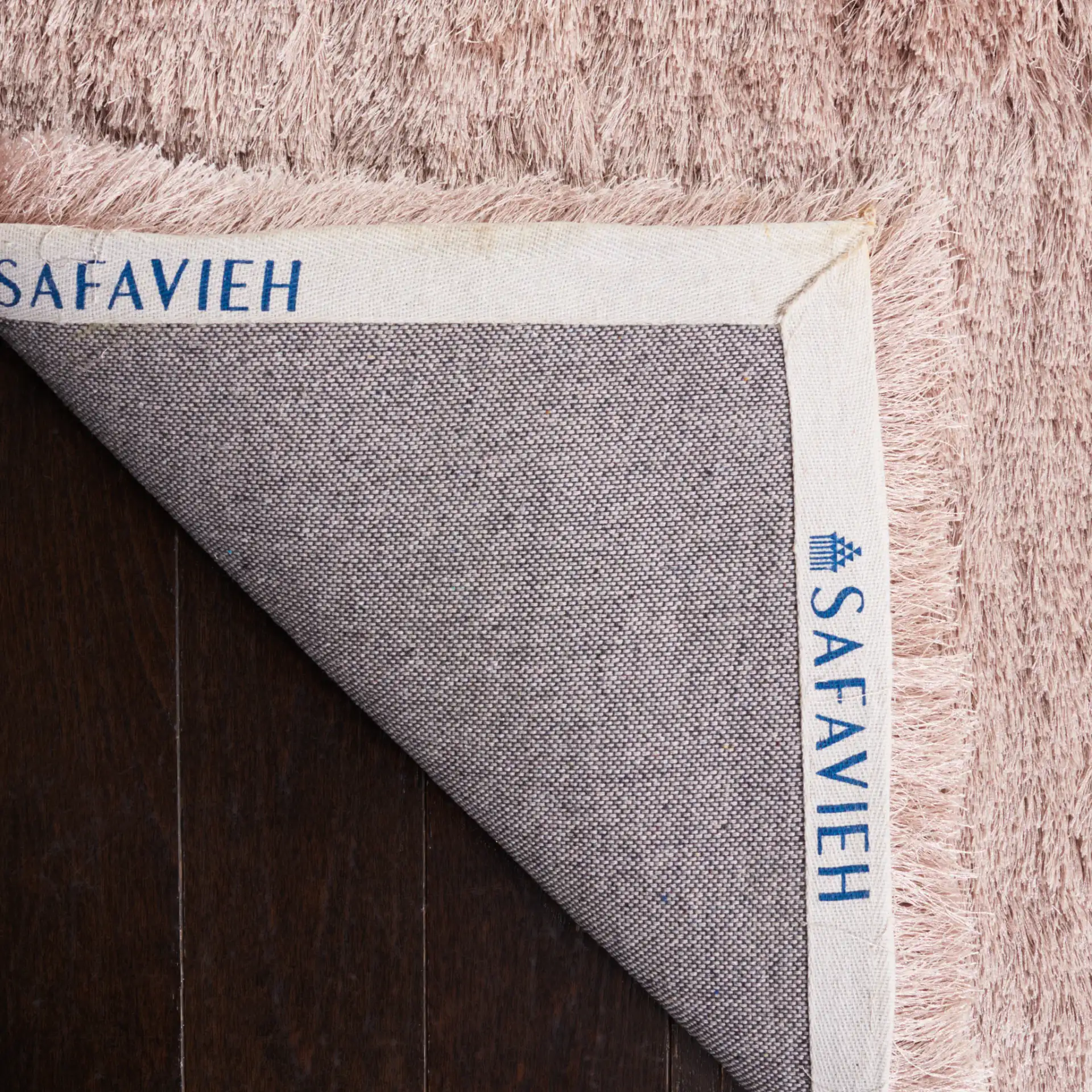 Paris Solid Hand-Tufted Shag Rug in Beige in a styled room