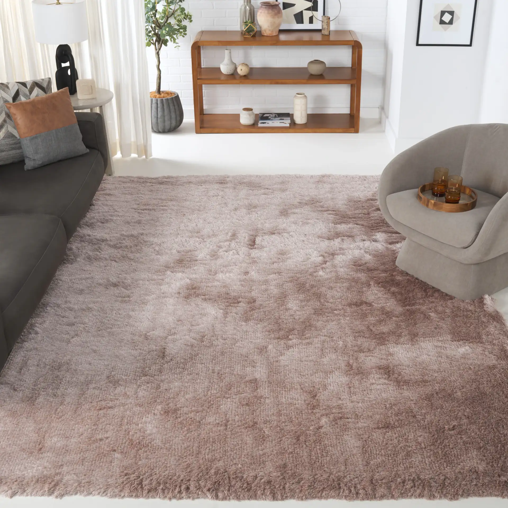 Paris Solid Hand-Tufted Shag Rug in Beige in a styled room