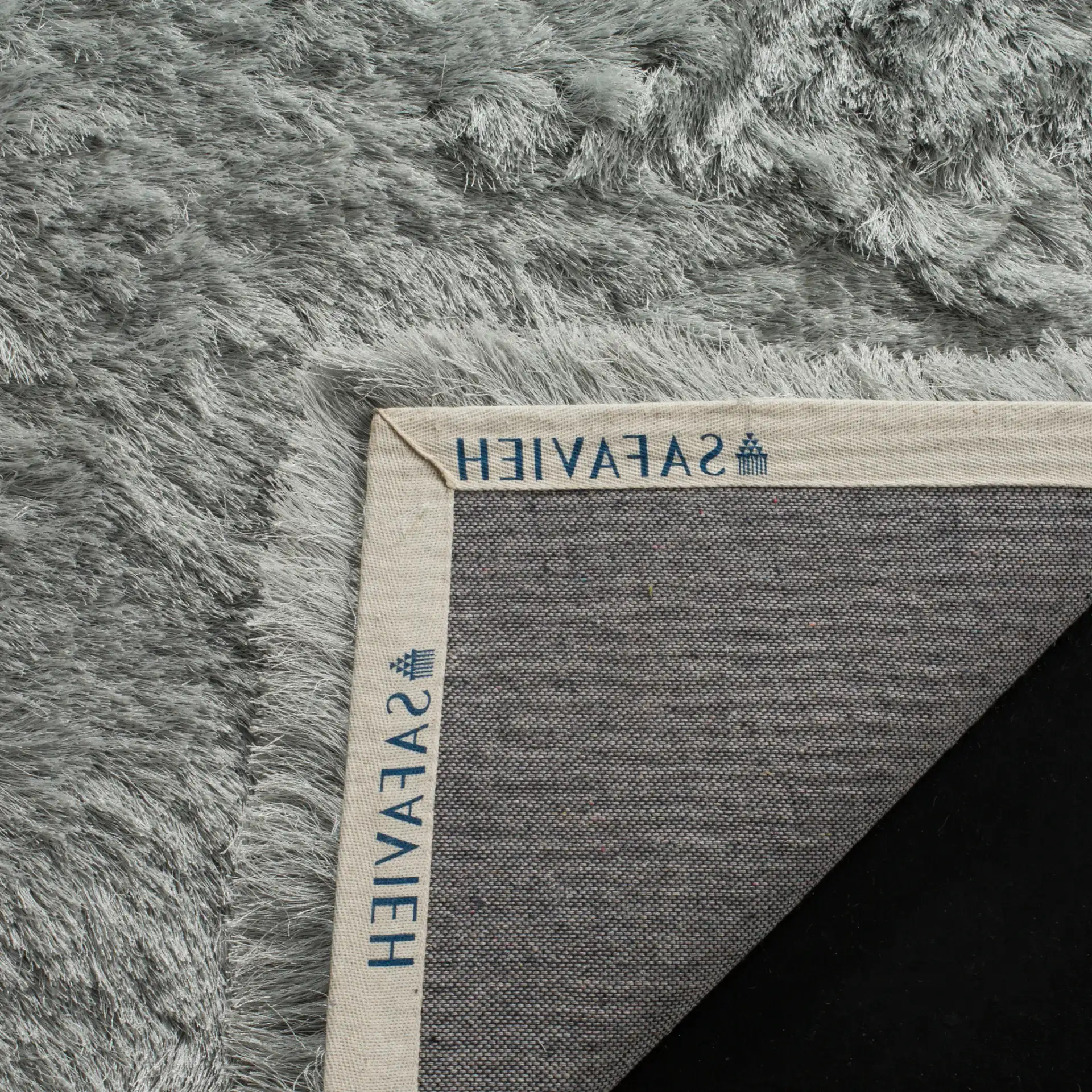 Paris Solid Hand-Tufted Shag Rug in Sage in a styled room