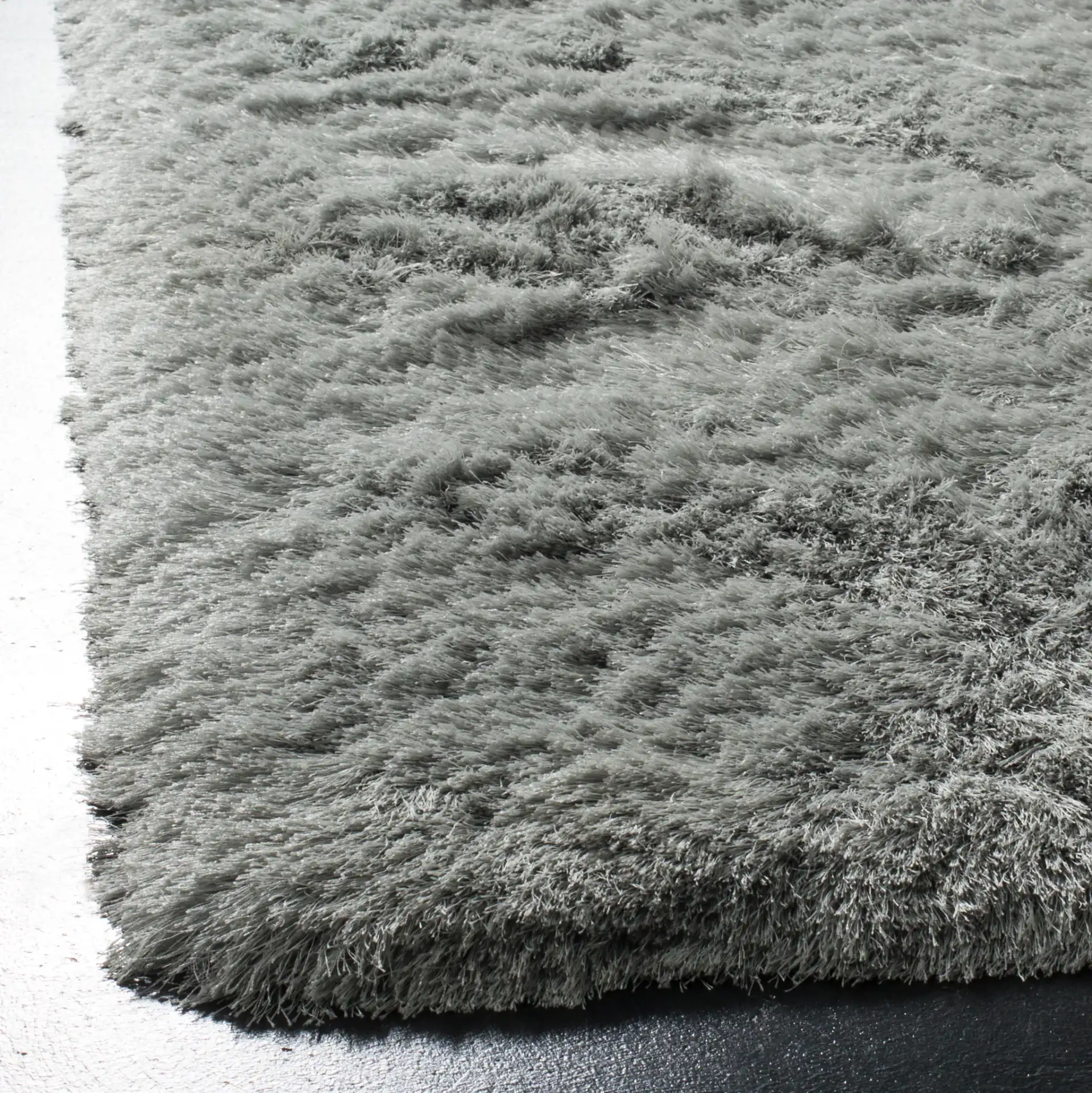 Paris Solid Hand-Tufted Shag Rug in Sage in a styled room