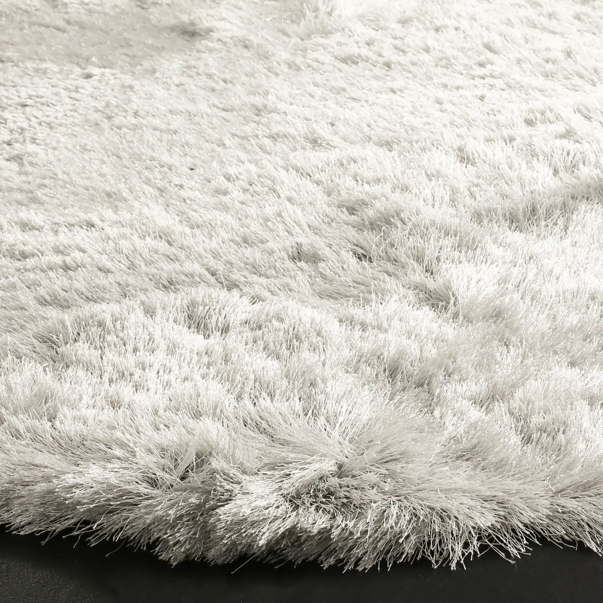 Paris Solid Hand-Tufted Shag Rug in Sage in a styled room