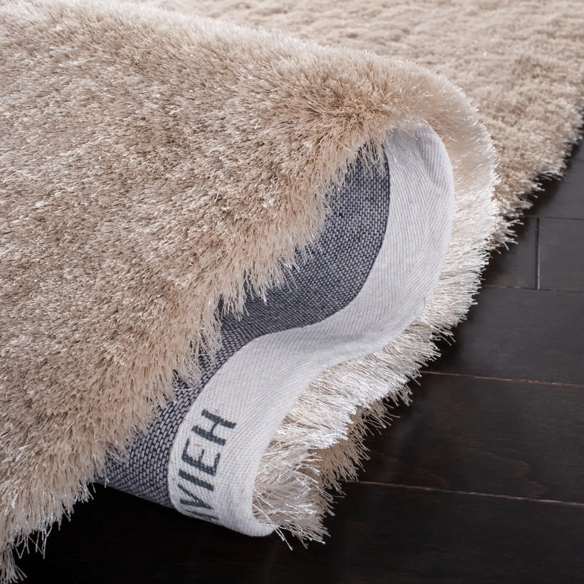 Paris Solid Hand-Tufted Shag Rug in Dark Beige in a styled room
