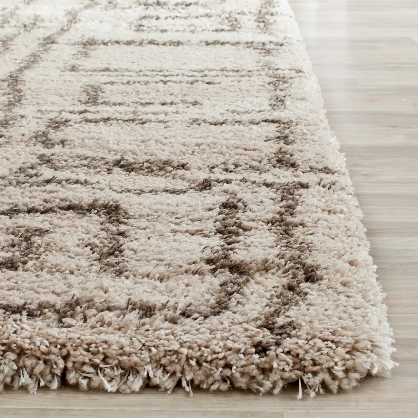 Belize Grid Panel Shag Rug in Taupe / Gray in a styled room
