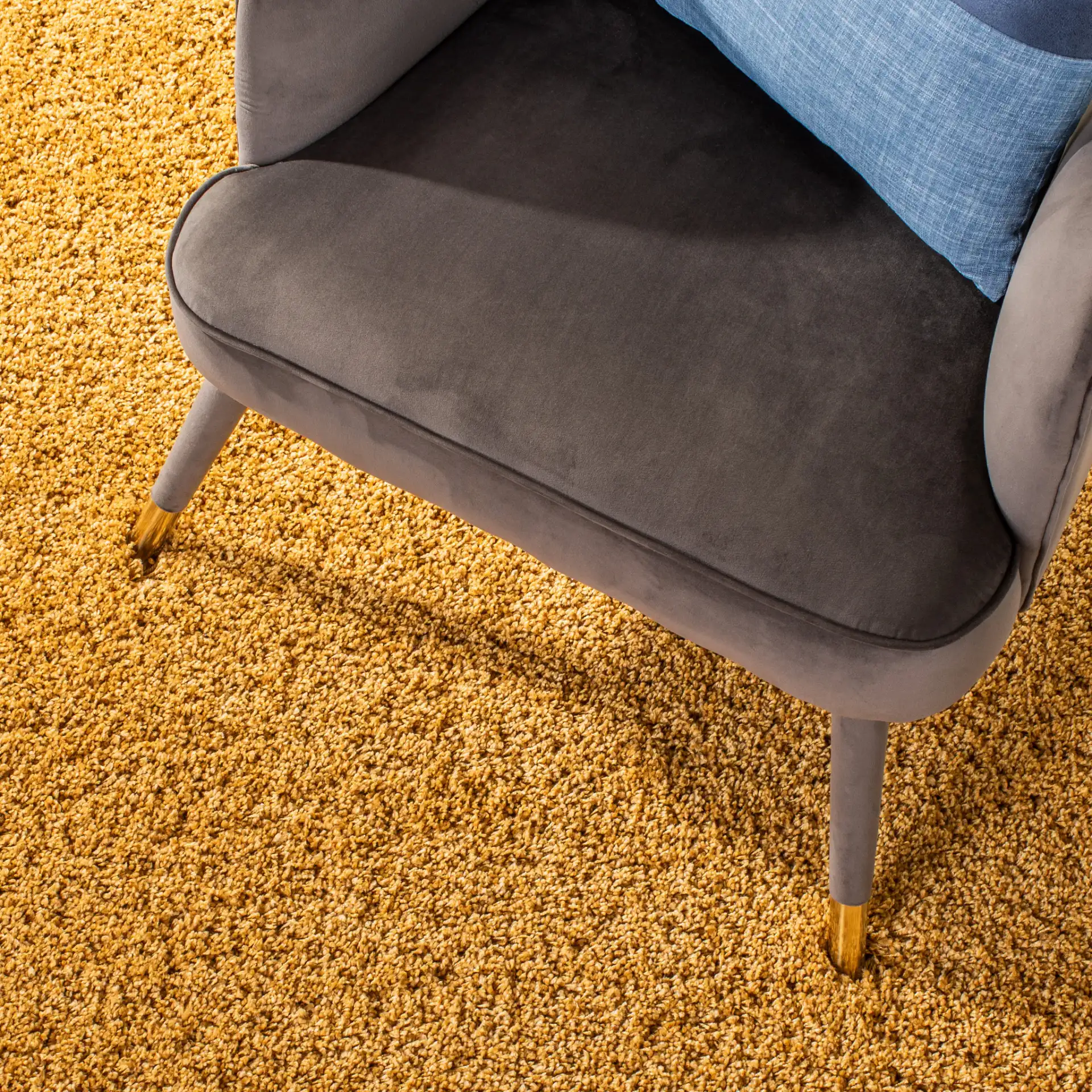 Hudson Solid Shag Rug in Gold in a styled room