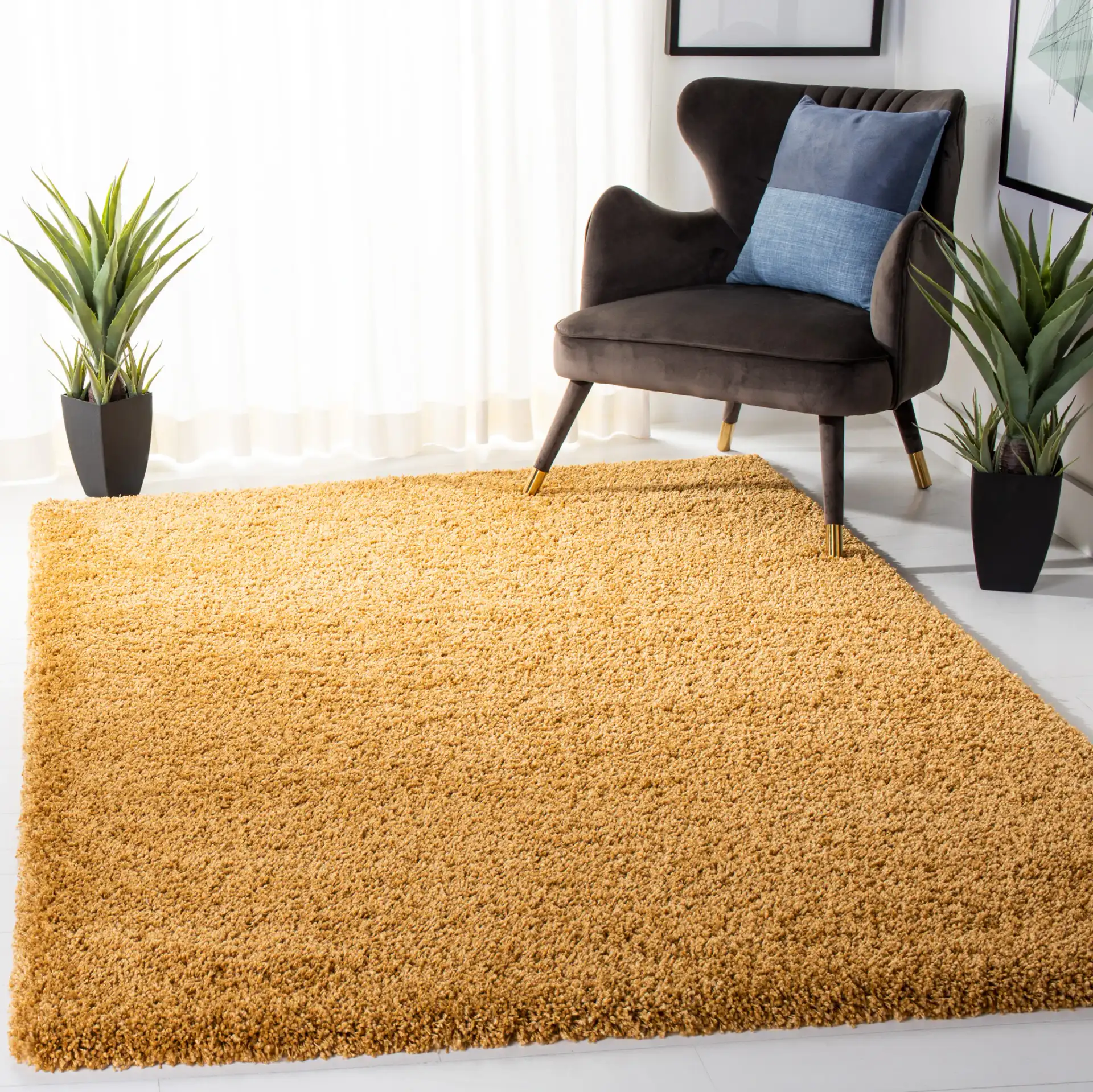 Hudson Solid Shag Rug in Gold in a styled room
