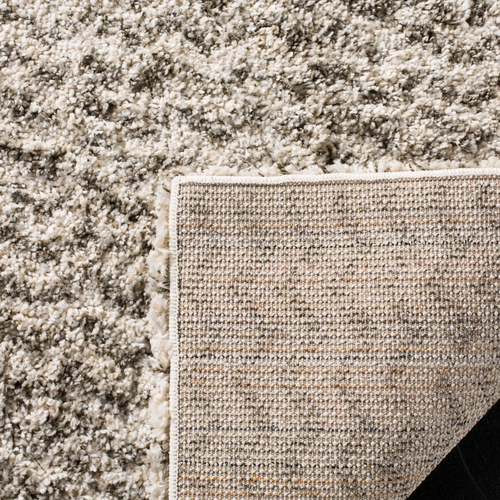 Hudson Textured Shag Rug in Ivory / Gray in a styled room
