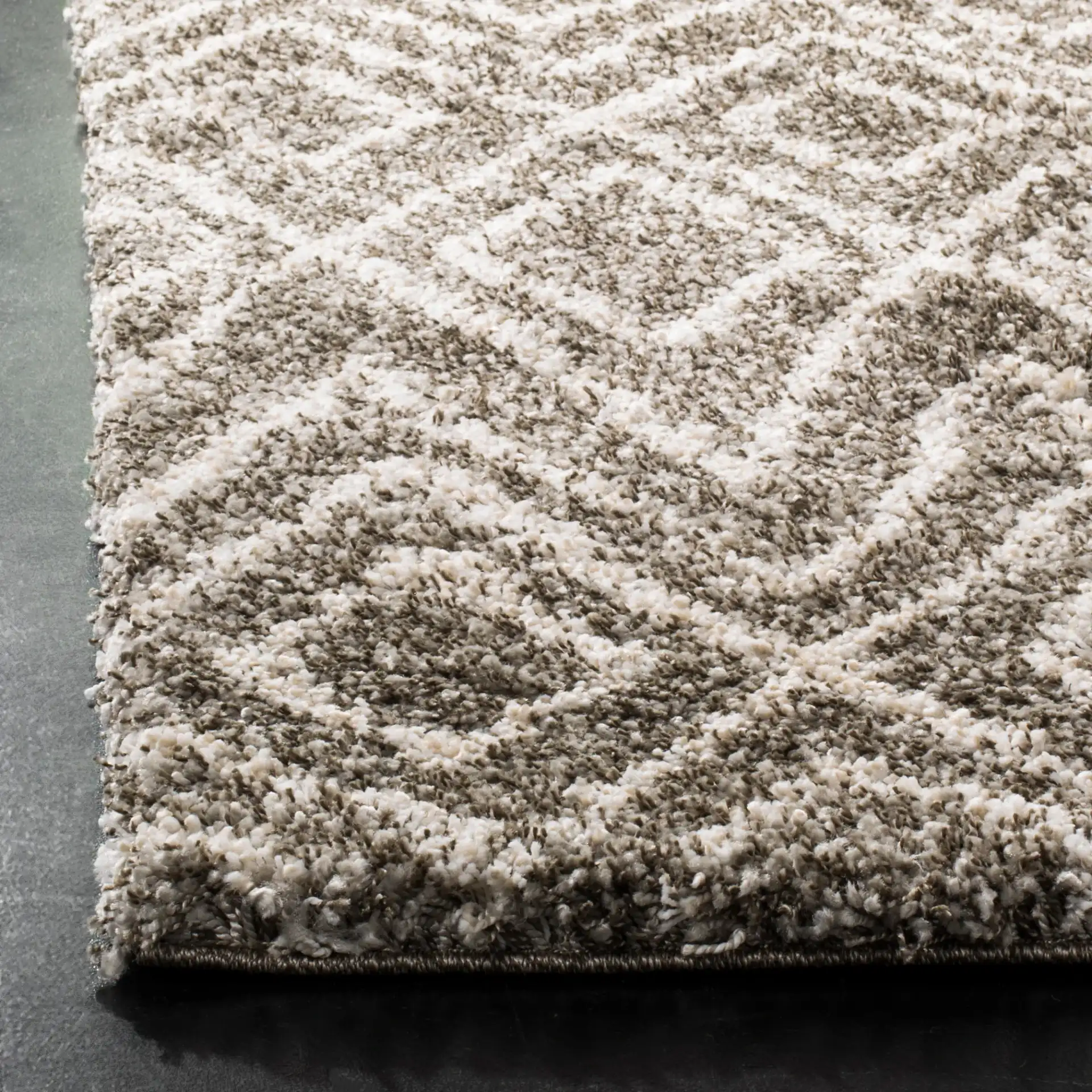 Hudson Nested Diamond Trellis Shag Rug in Gray / Ivory in a styled room