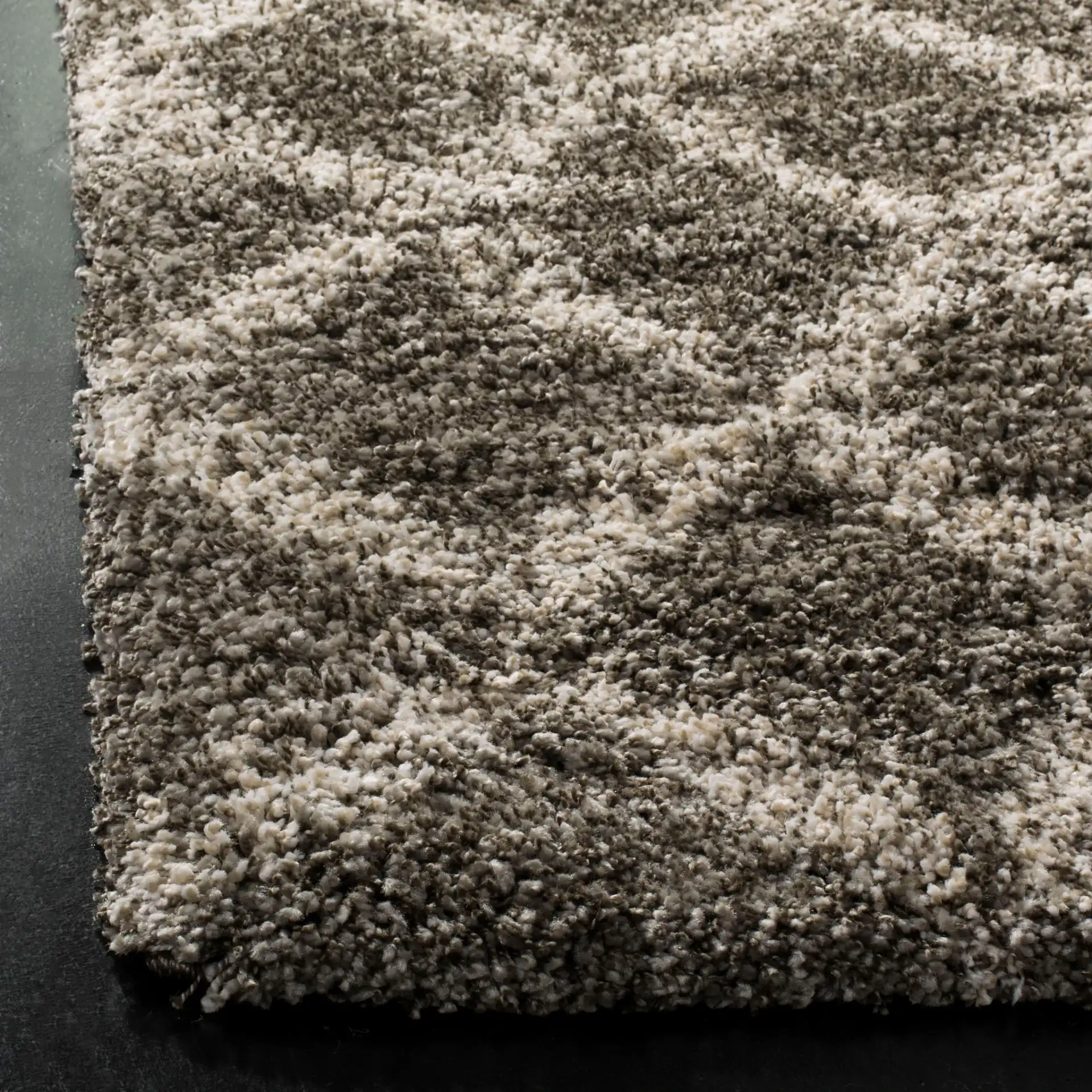 Hudson Small Diamond Trellis Shag Rug in Gray / Ivory in a styled room