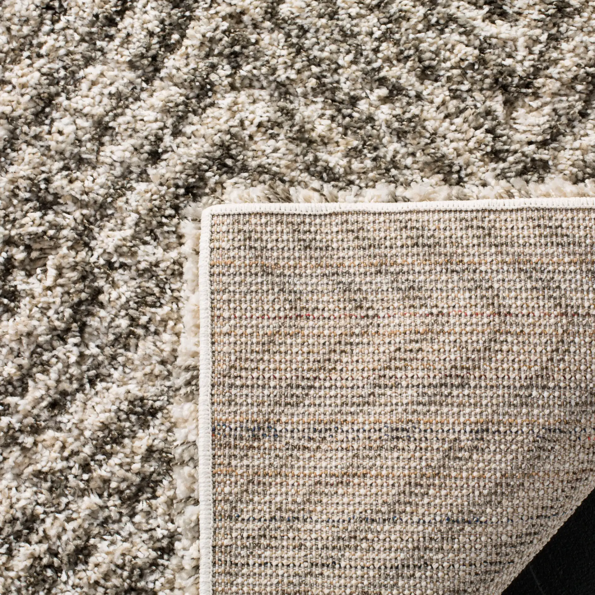Hudson Chevron Shag Rug in Ivory / Gray in a styled room