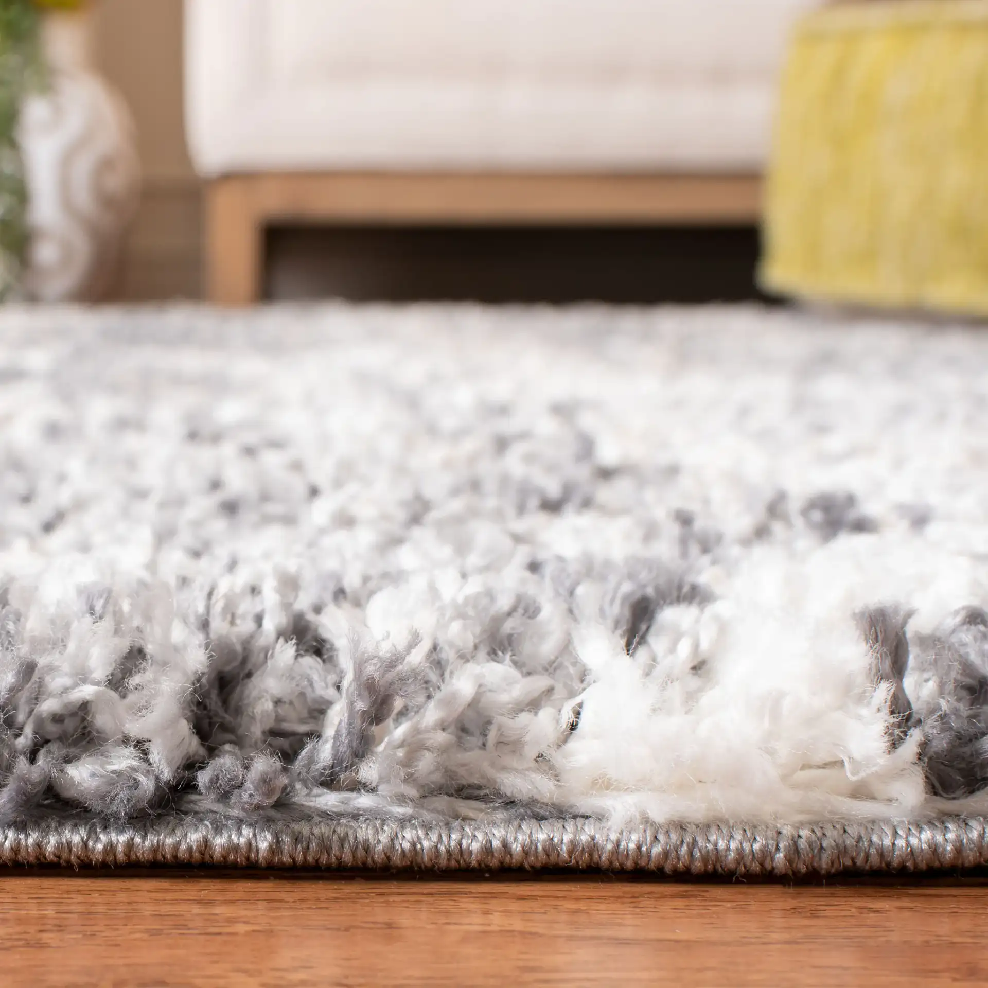 Melrose Lattice Shag Rug in Dark Gray / Ivory in a styled room