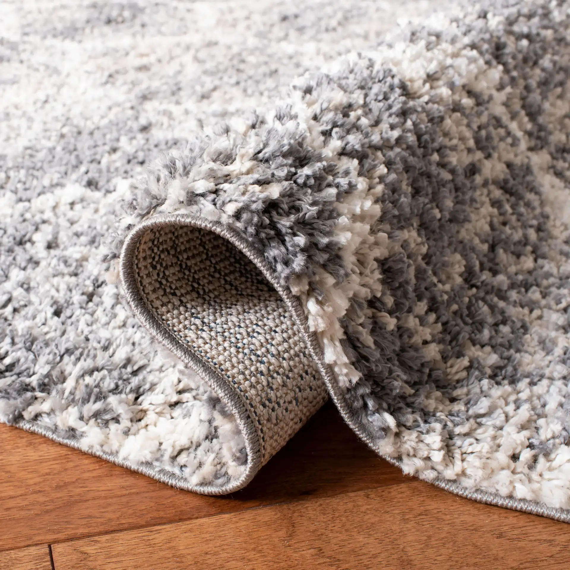 Melrose Lattice Shag Rug in Dark Gray / Ivory in a styled room
