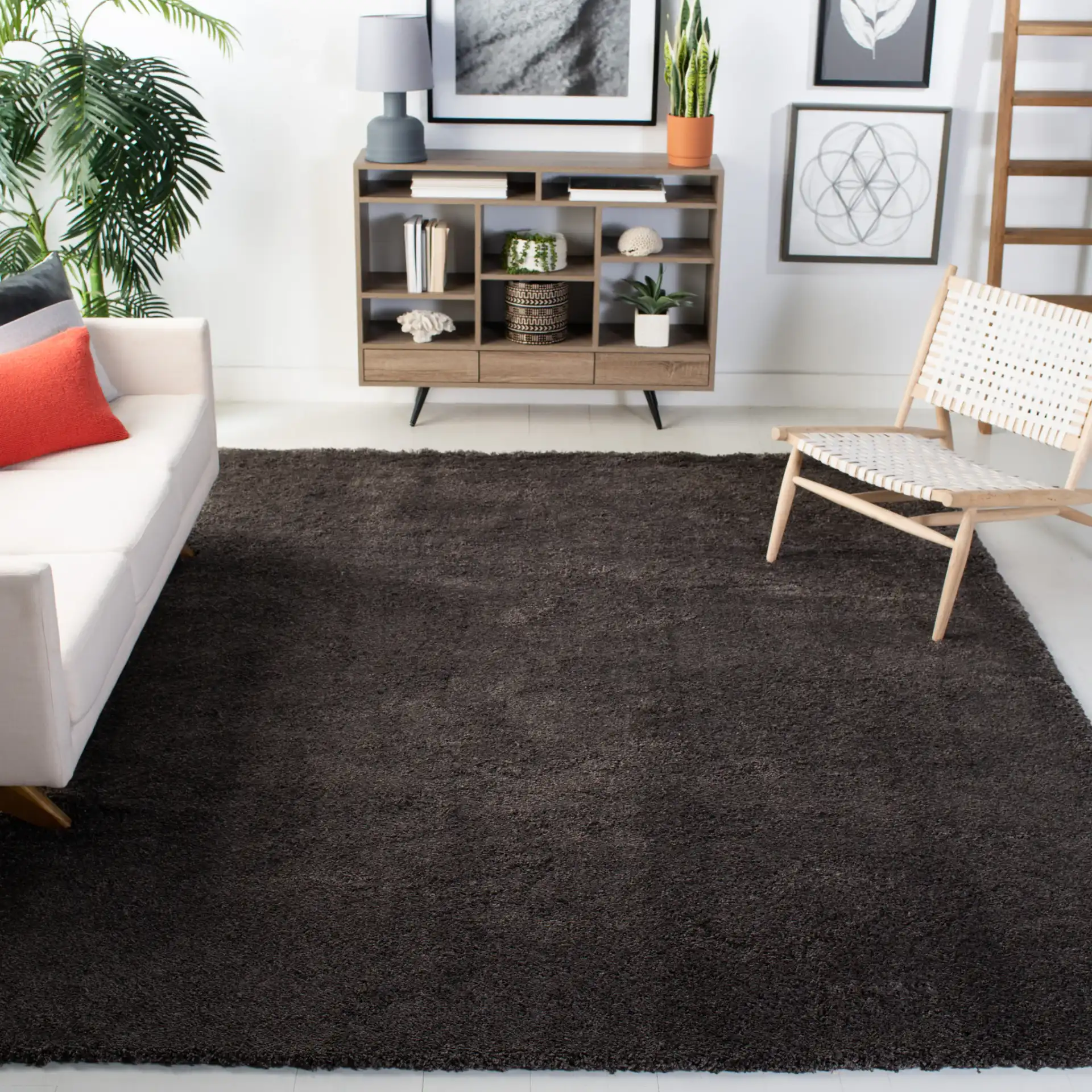 Reno Solid Shag Rug in Dark Gray in a styled room