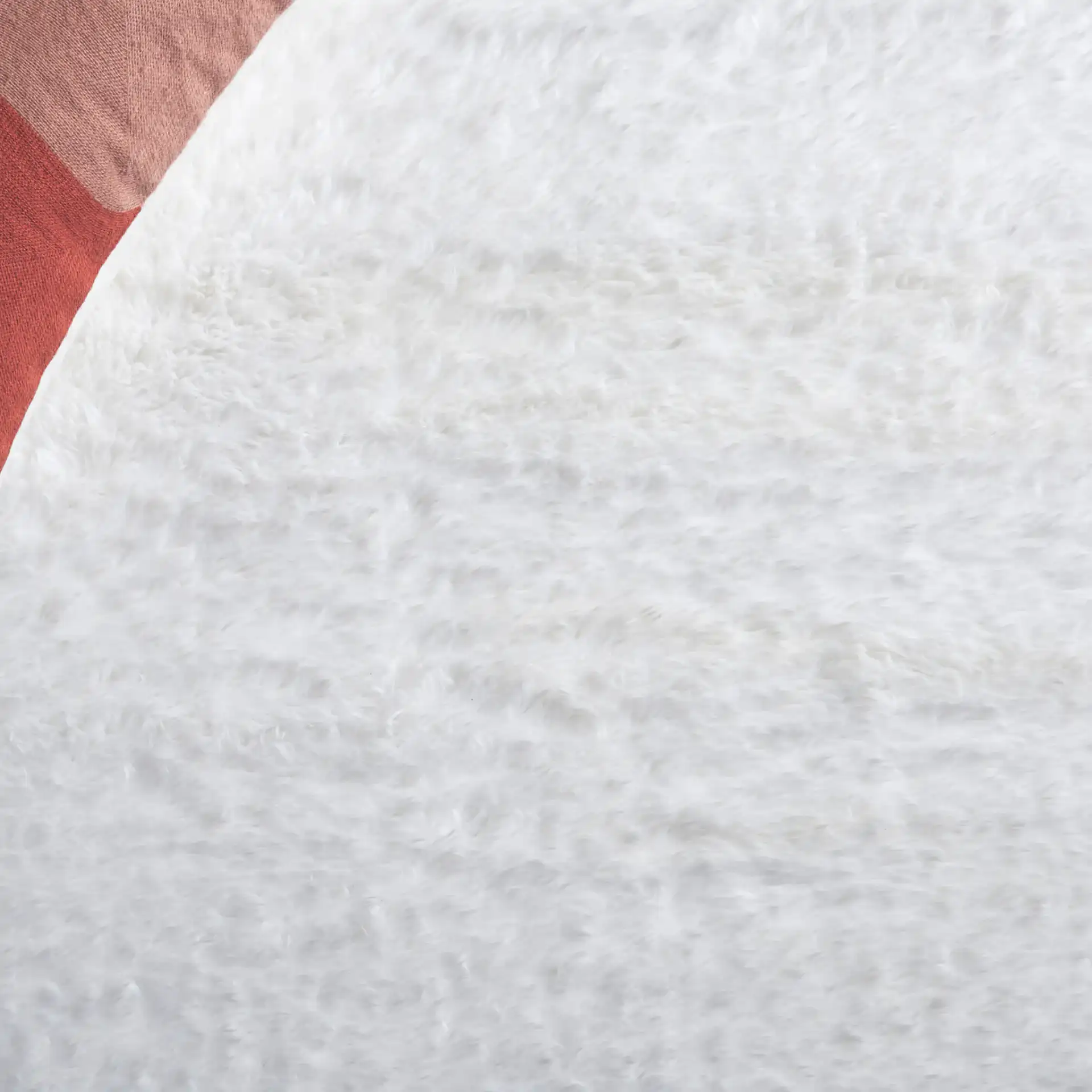 Tokyo Shag Solid Washable Rug in Ivory in a styled room