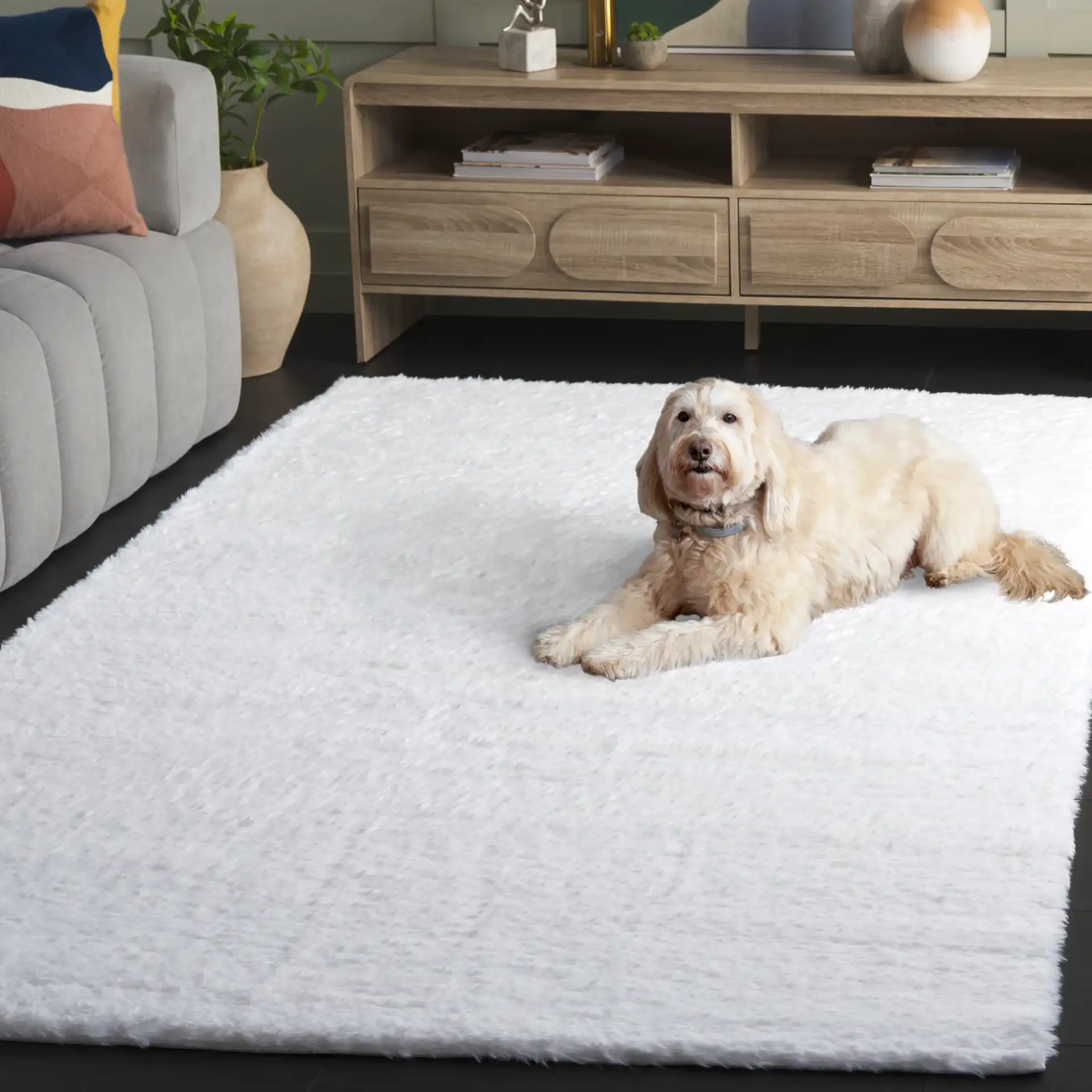 Tokyo Shag Solid Washable Rug in Ivory in a styled room
