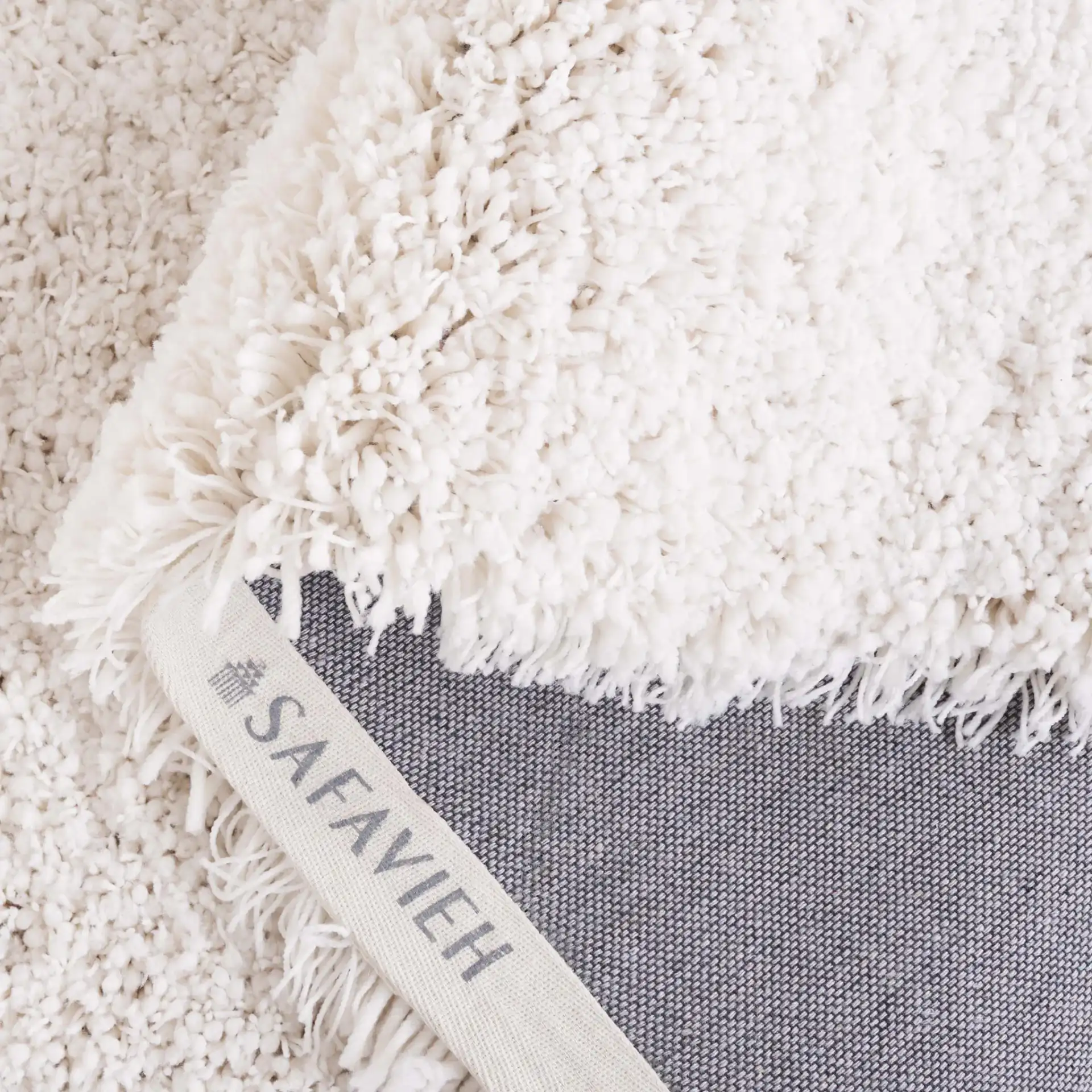 Luxe Solid Shag Rug in White in a styled room