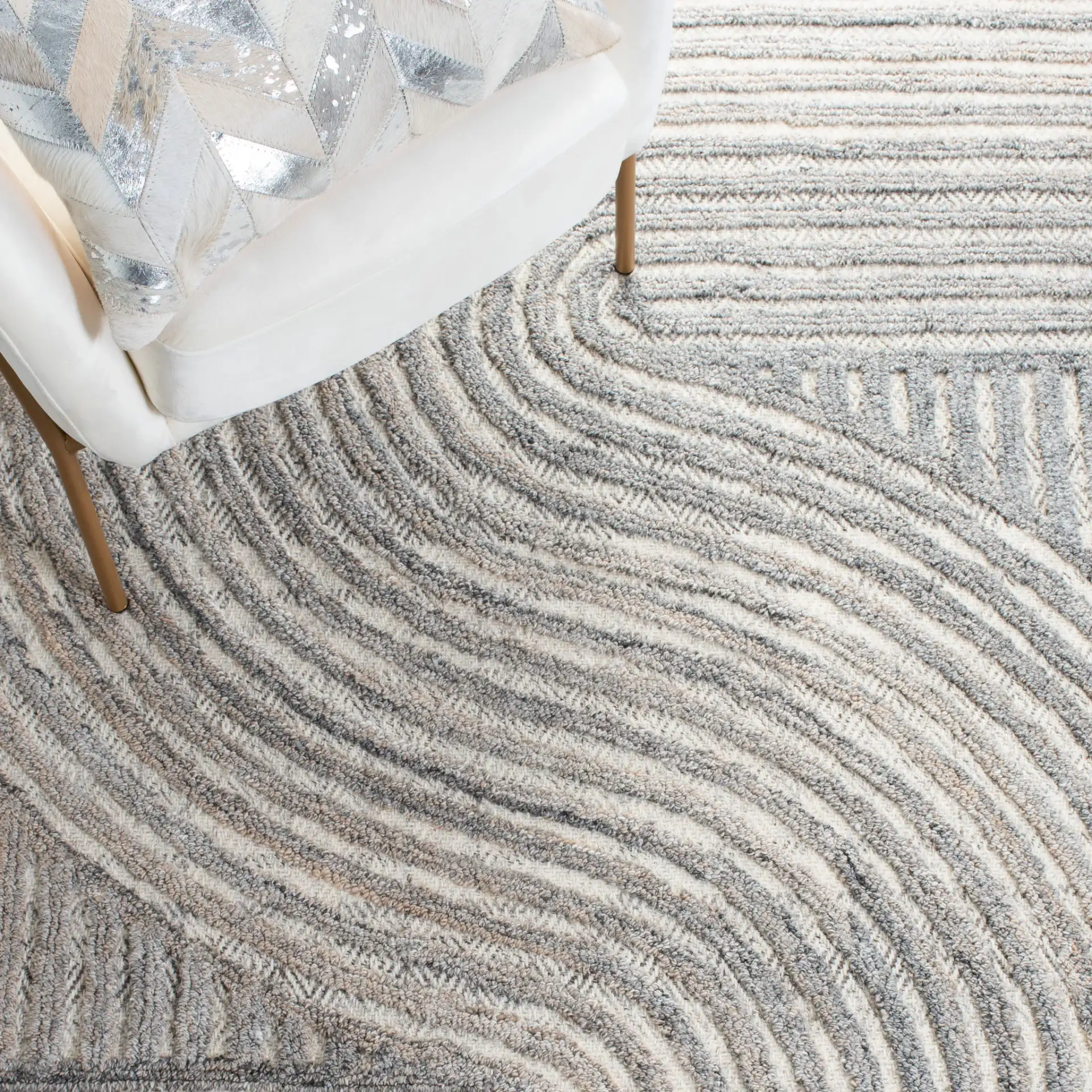 Southampton Curved Stripe Hand-Tufted Rug in Beige / Light Blue in a styled room