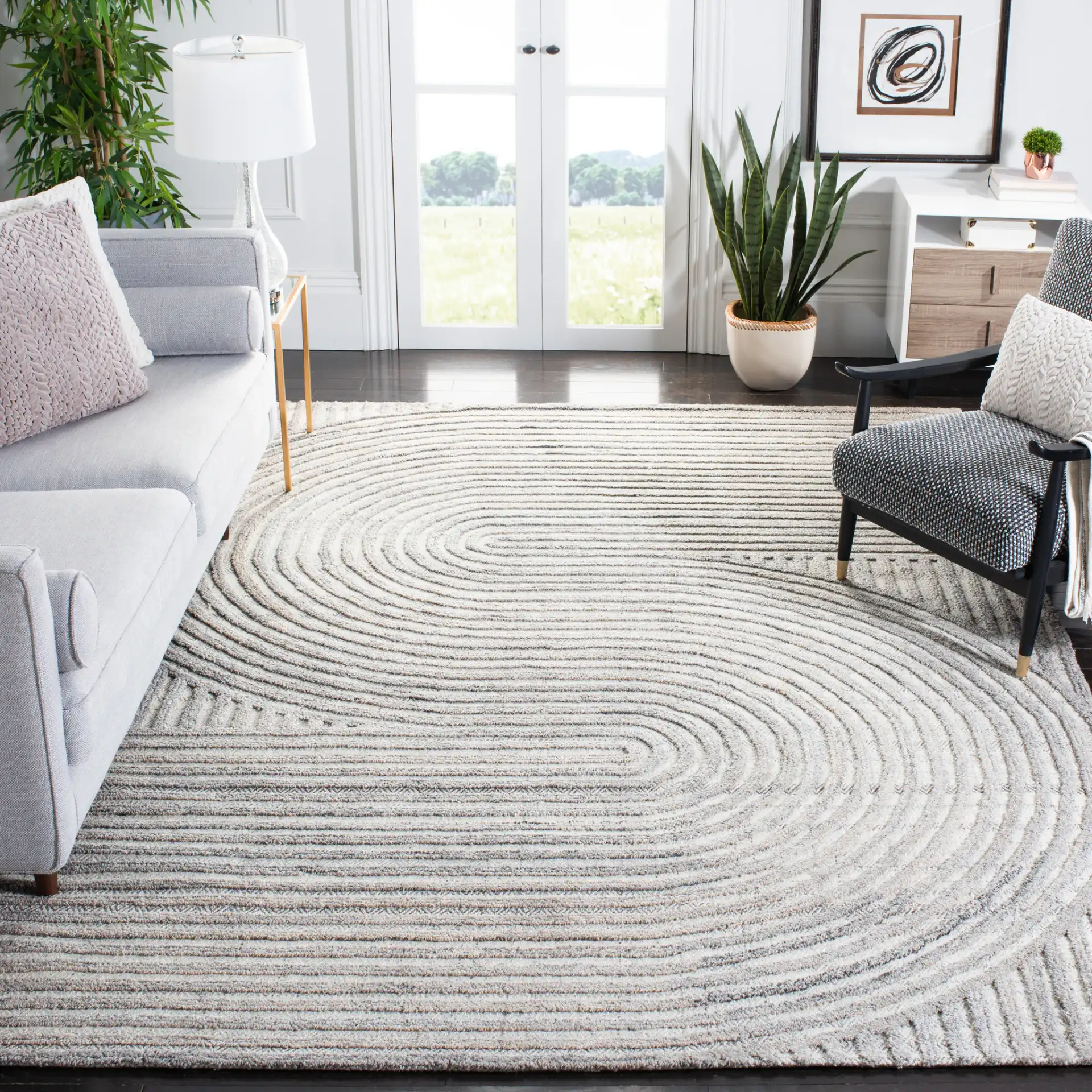 Southampton Curved Stripe Hand-Tufted Rug in Beige / Light Blue in a styled room