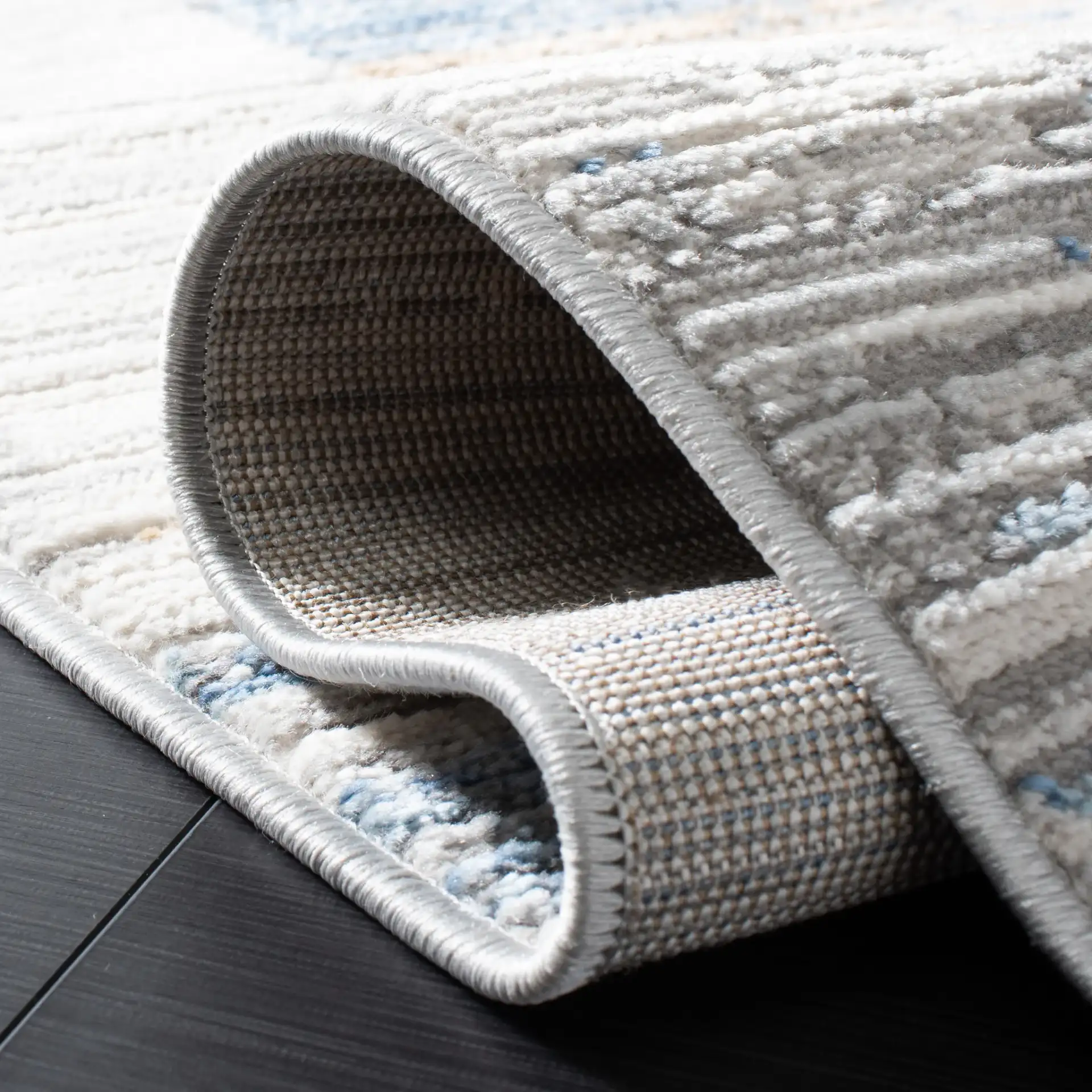 Shivan Abstract Block Rug in Ivory / Blue in a styled room