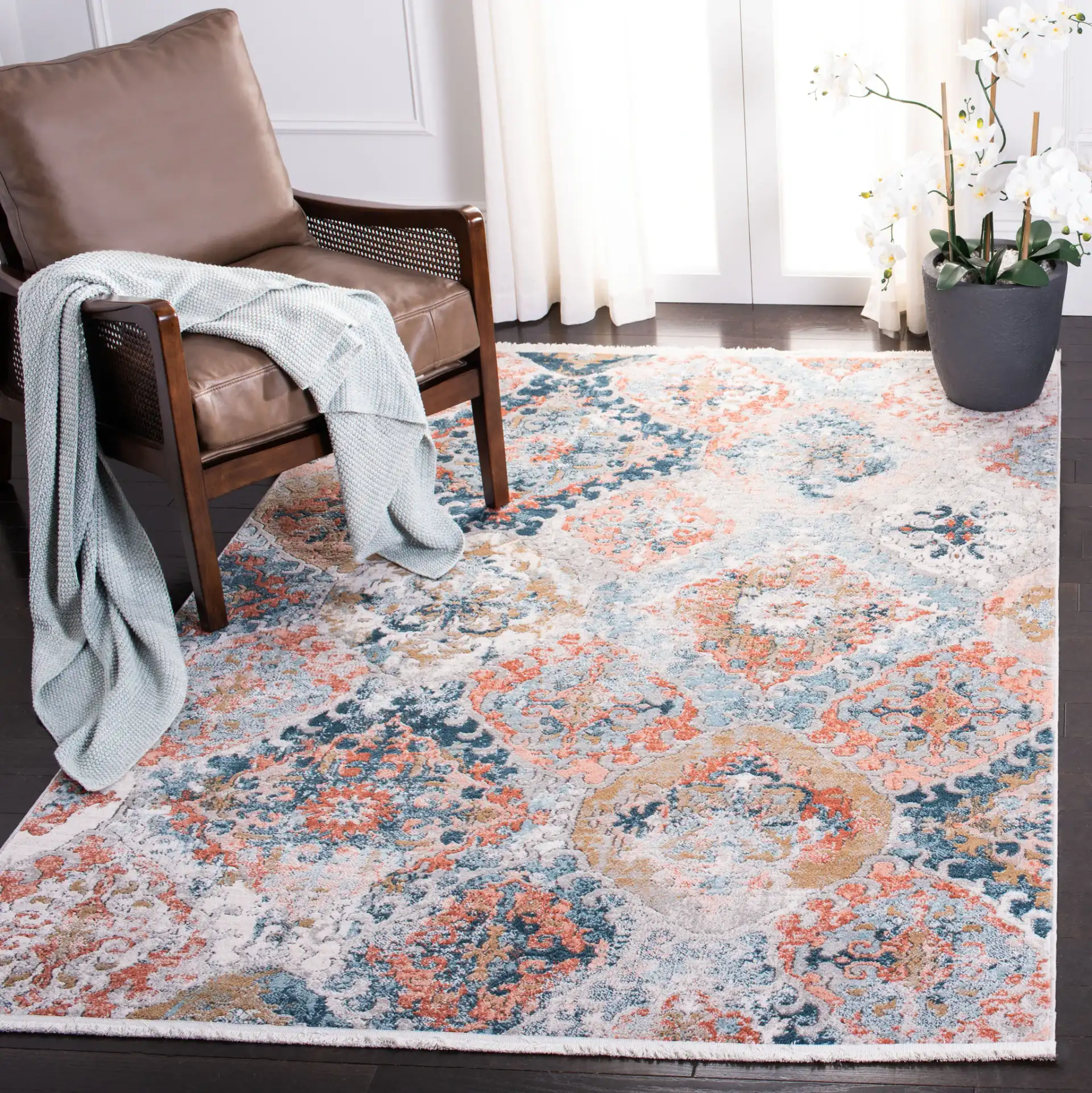 Shivan Medallion Tile Rug in Blue / Rose in a styled room