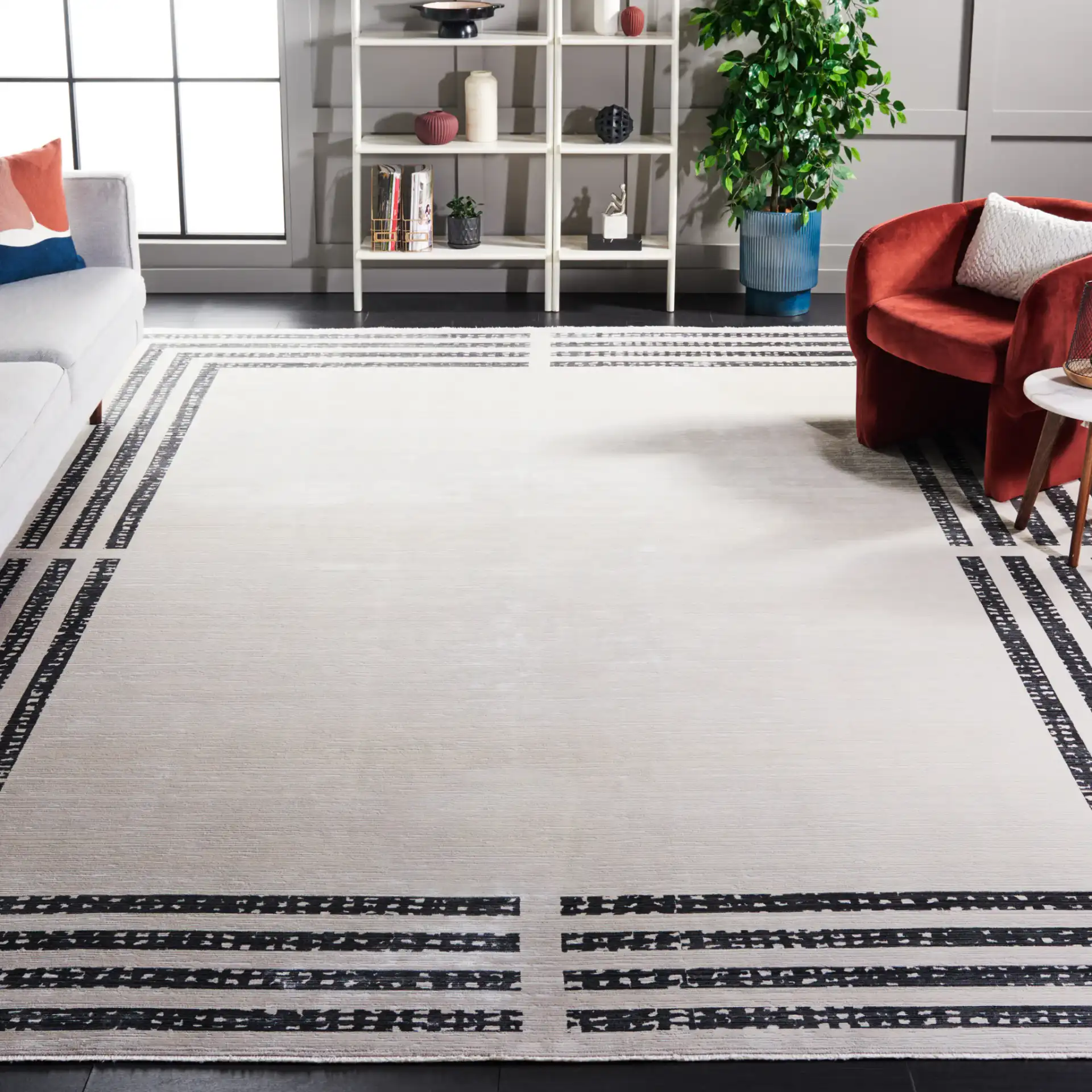 Signature Linear Frame Rug in Ivory / Black in a styled room