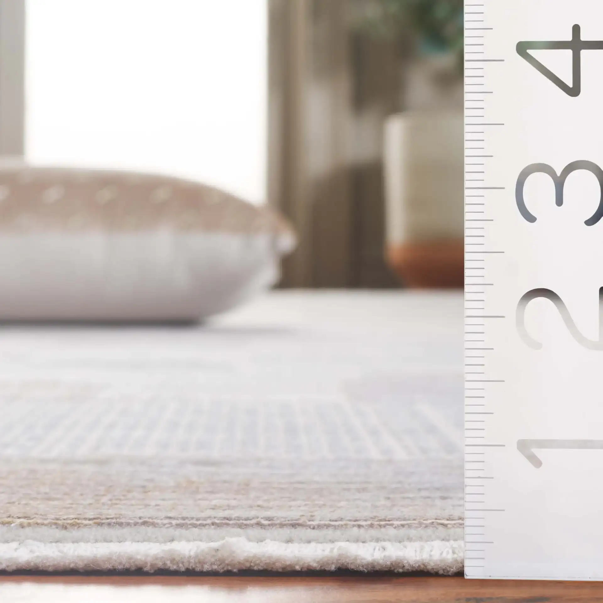 Signature Grid Patchwork Rug in Gray / Blue in a styled room