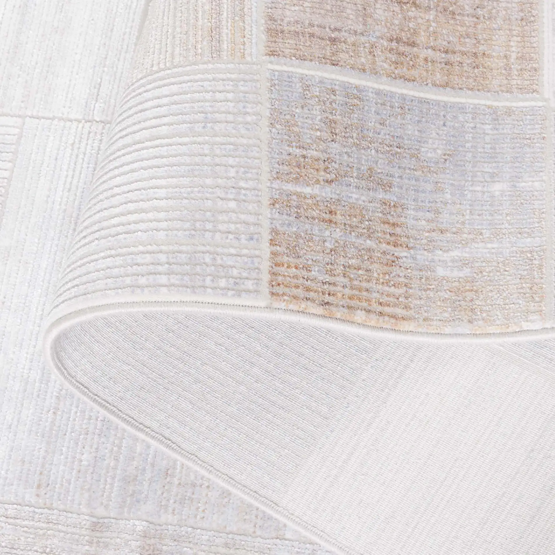 Signature Grid Patchwork Rug in Gray / Blue in a styled room