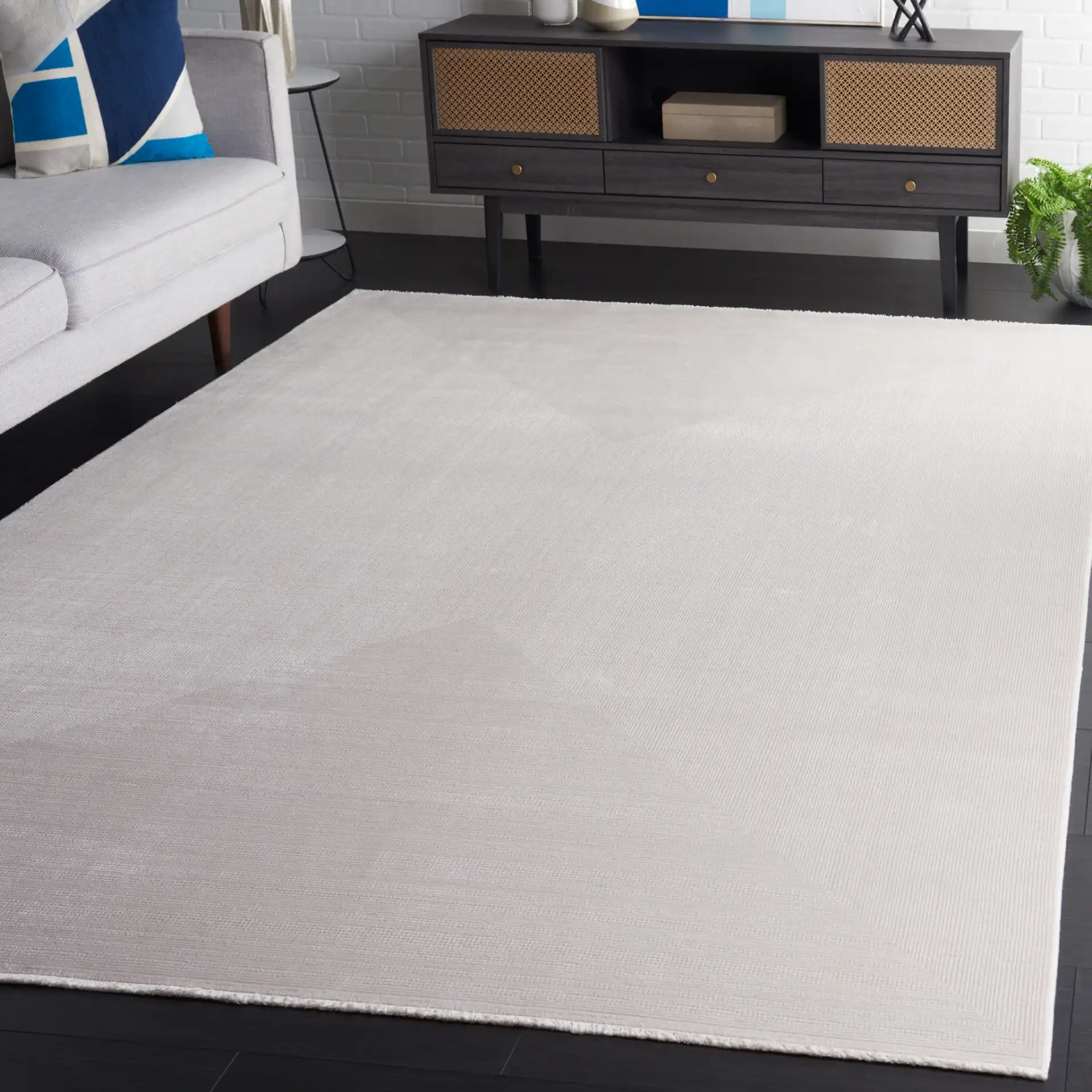 Signature Silken Solid Ribbed Rug in Ivory in a styled room
