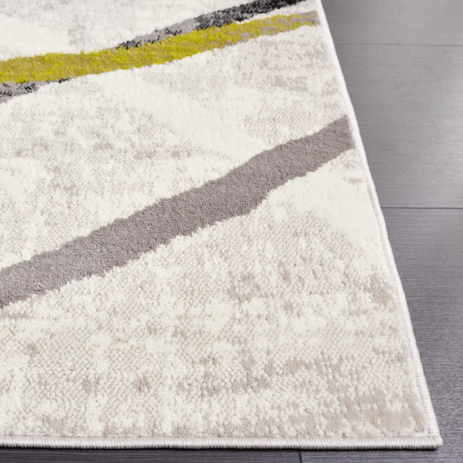 Skyler Abstract Wave Rug in Ivory Gray / Green in a styled room