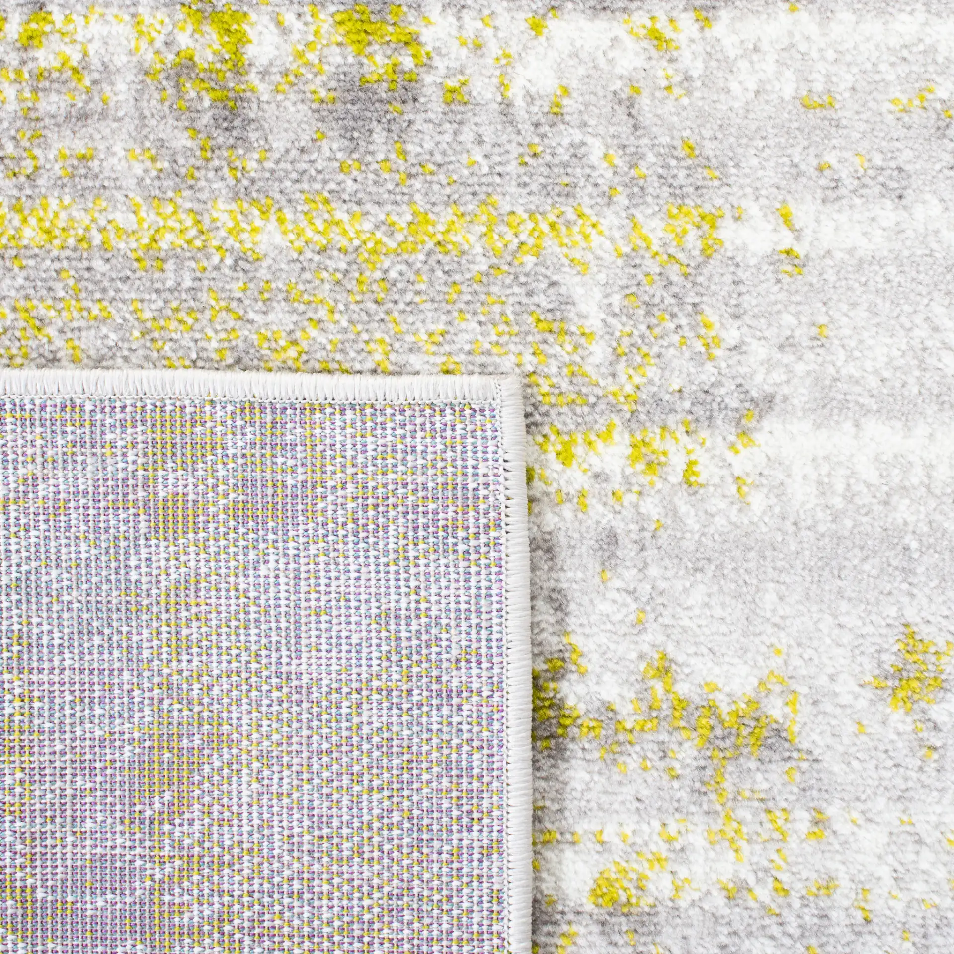 Skyler Distressed Stripe Rug in Silver / Green in a styled room