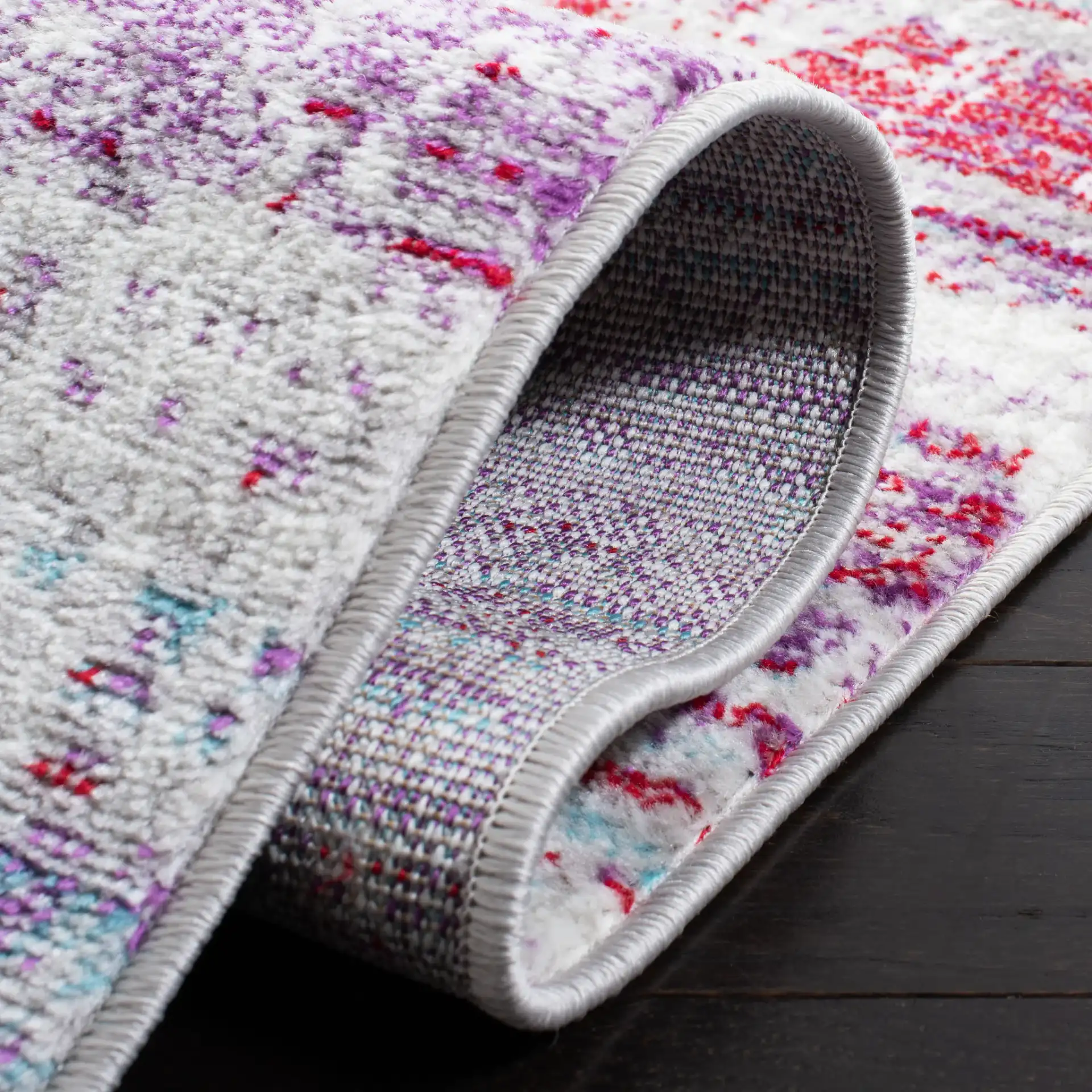 Skyler Abstract Linear Rug in Silver / Purple in a styled room