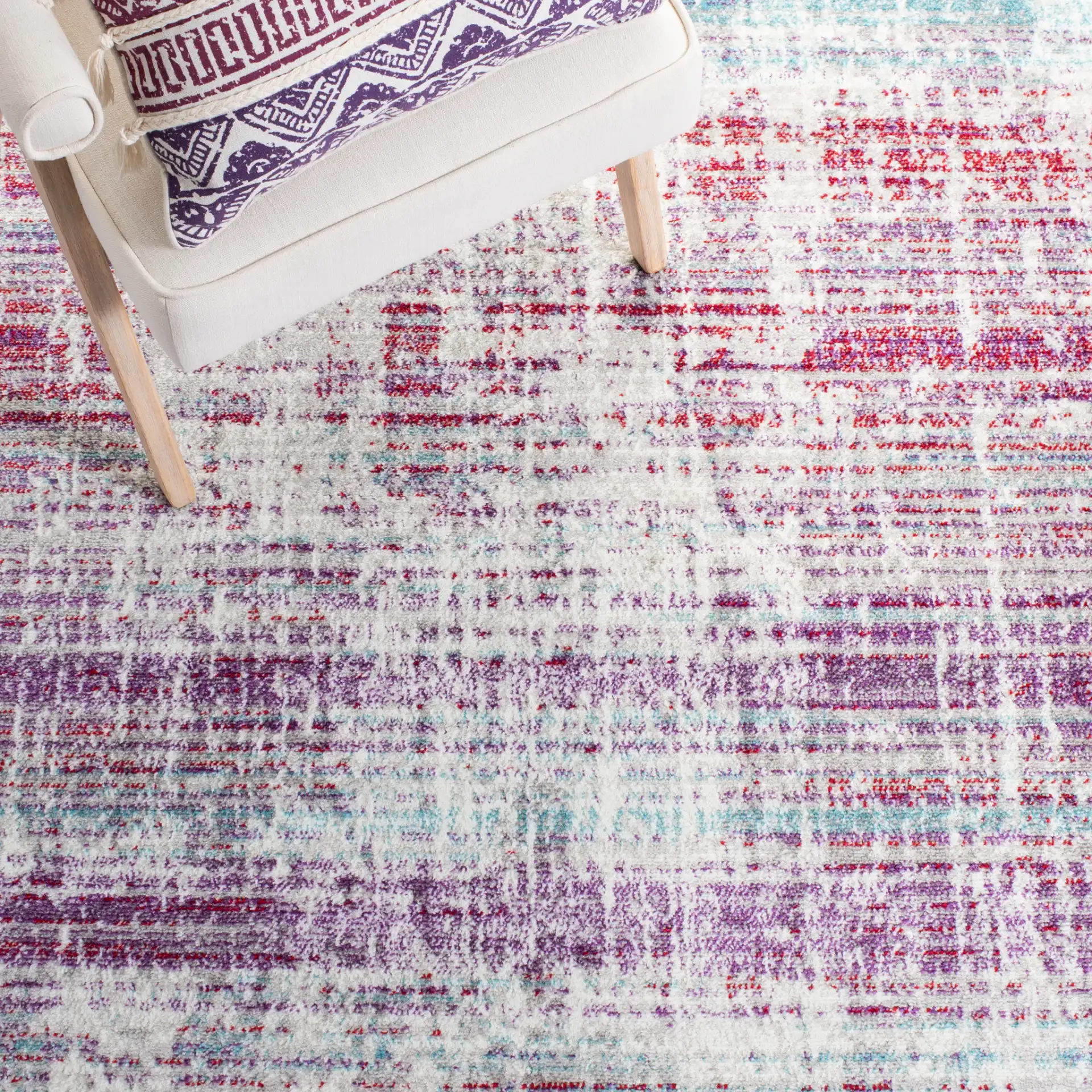 Skyler Abstract Linear Rug in Silver / Purple in a styled room